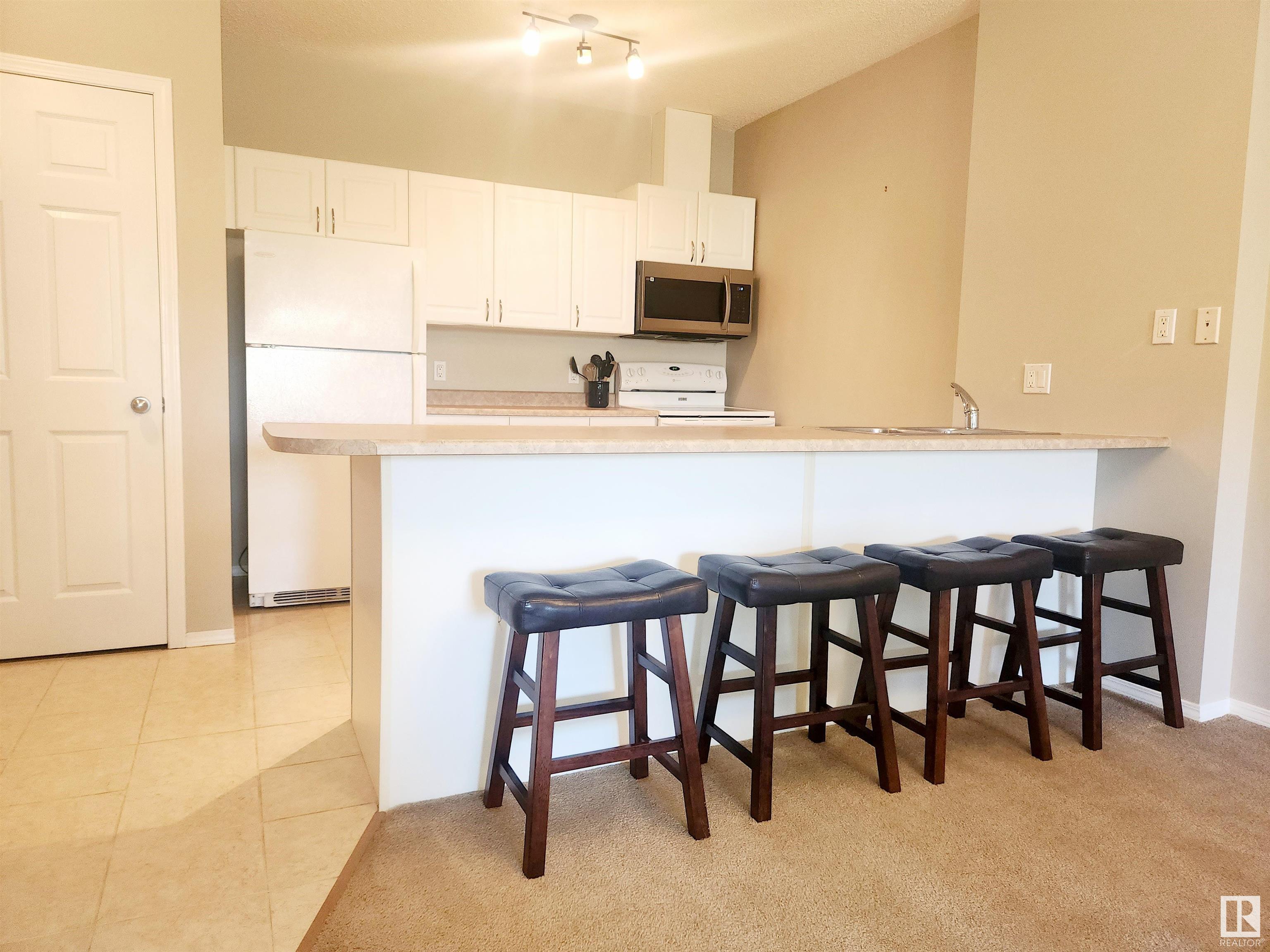 Property Photo: 9919 105 Street NW 403 AB T5K 1B1