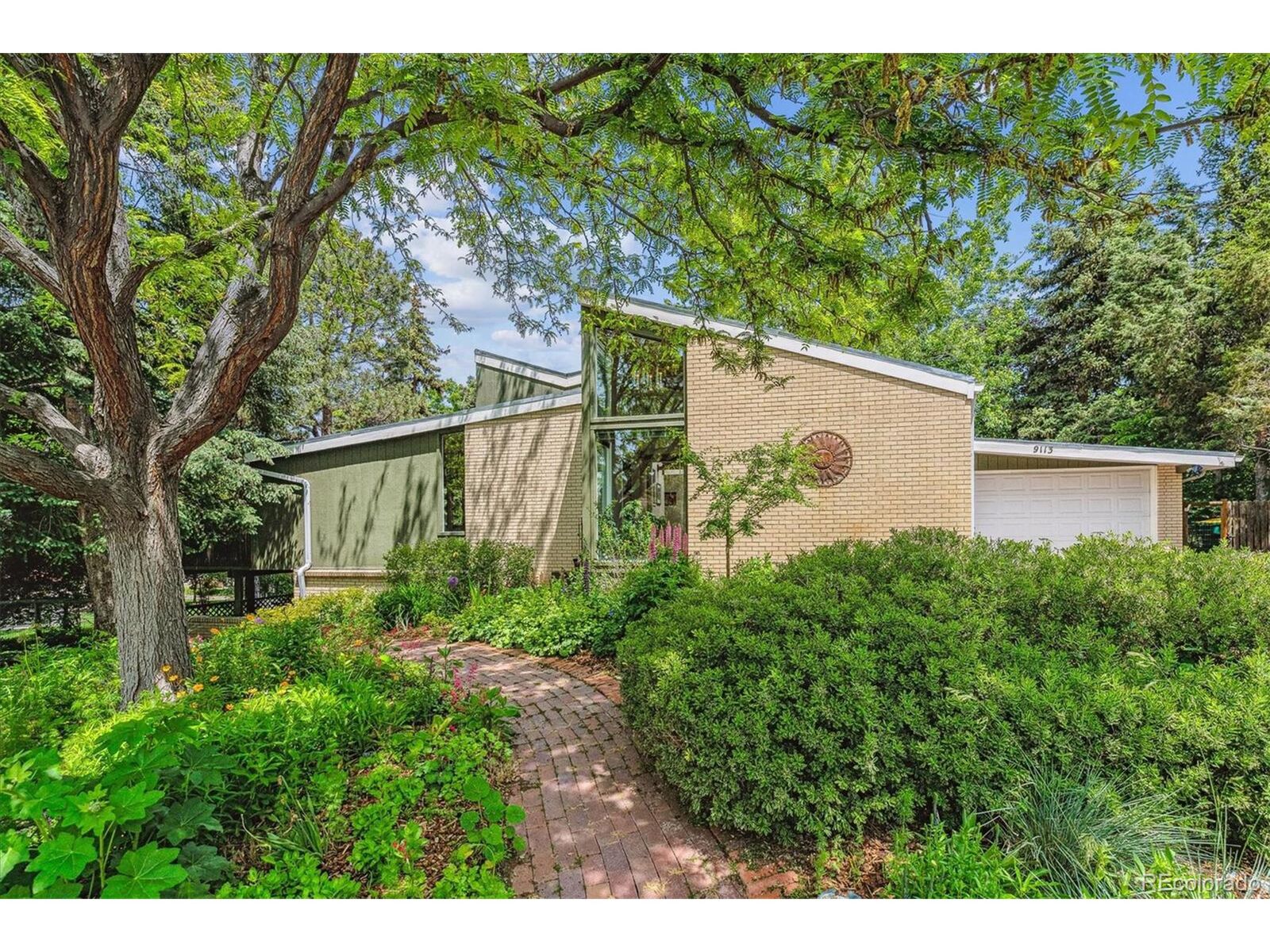 Property Photo: 9113 E Evans Way CO 80231