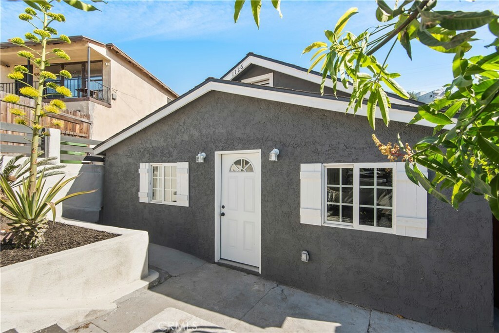Property Photo:  1126 Stone St  CA 90063 