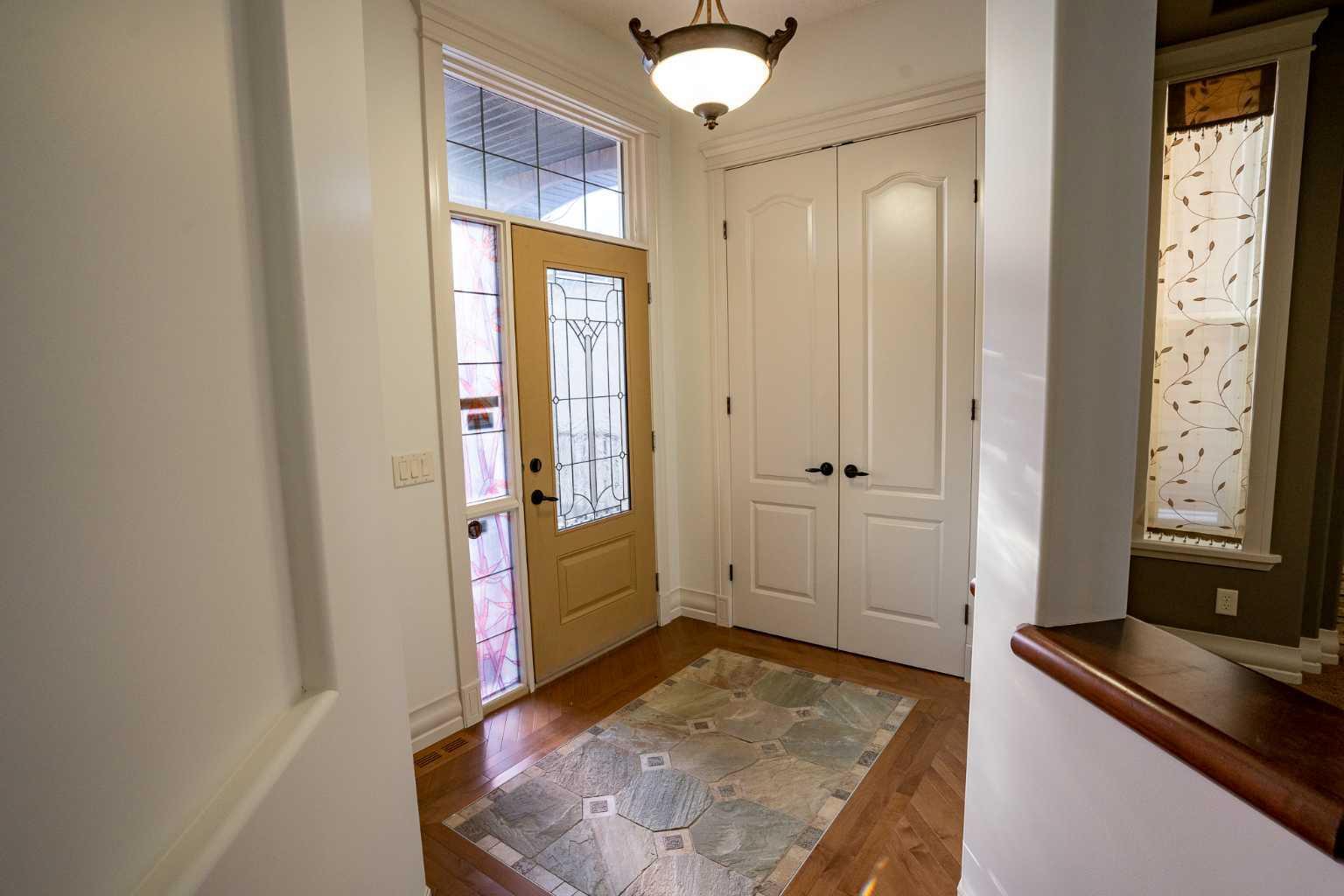 Property Photo: 208 Coopers Grove SW AB T4B 0G4