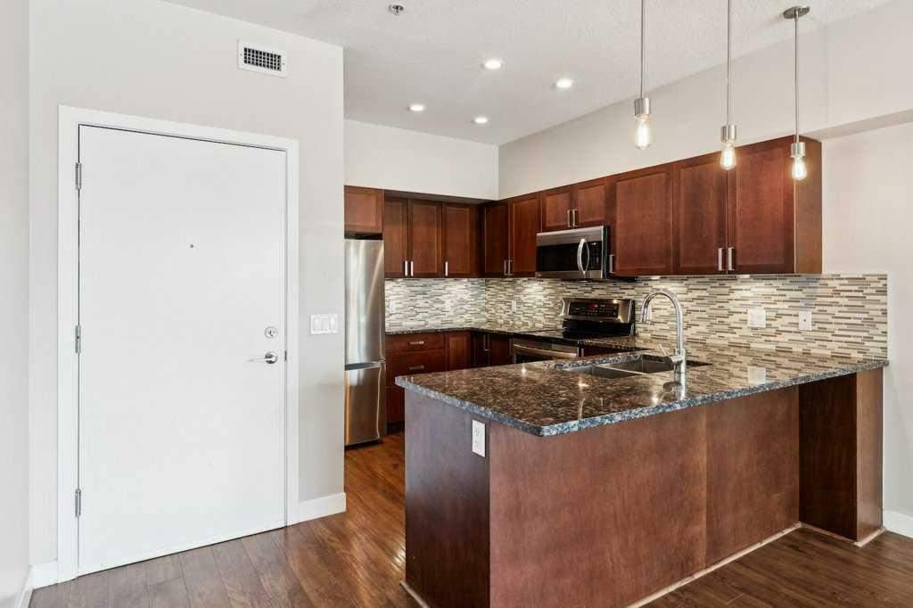 Property Photo: 4303 1 Street NE 232 AB T2E 7M3