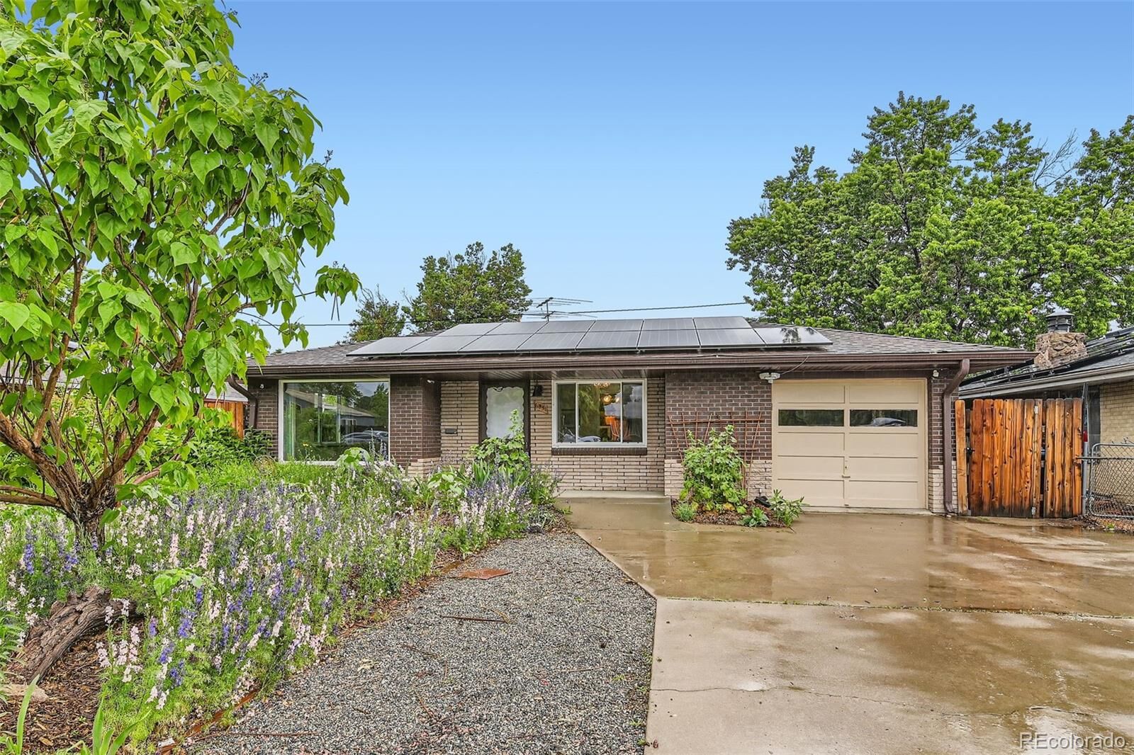 Property Photo:  6051 Ivanhoe Street  CO 80022 