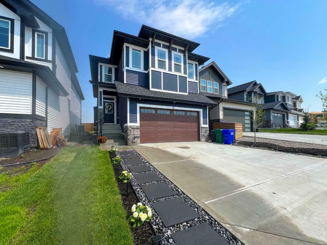 Property Photo: 11 Heritage Circle AB T4C 3G9