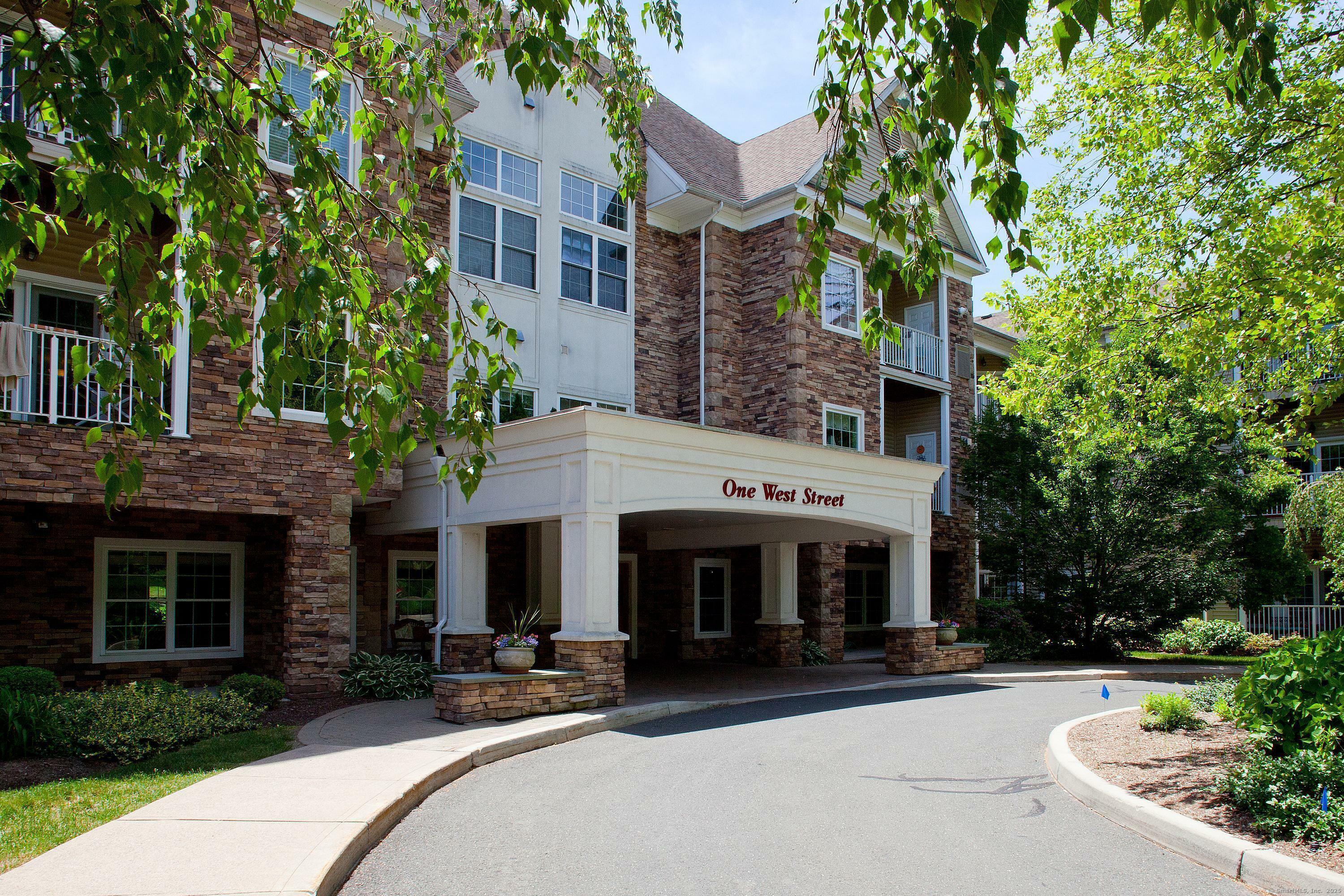Property Photo: 1 West Street 205 CT 06070