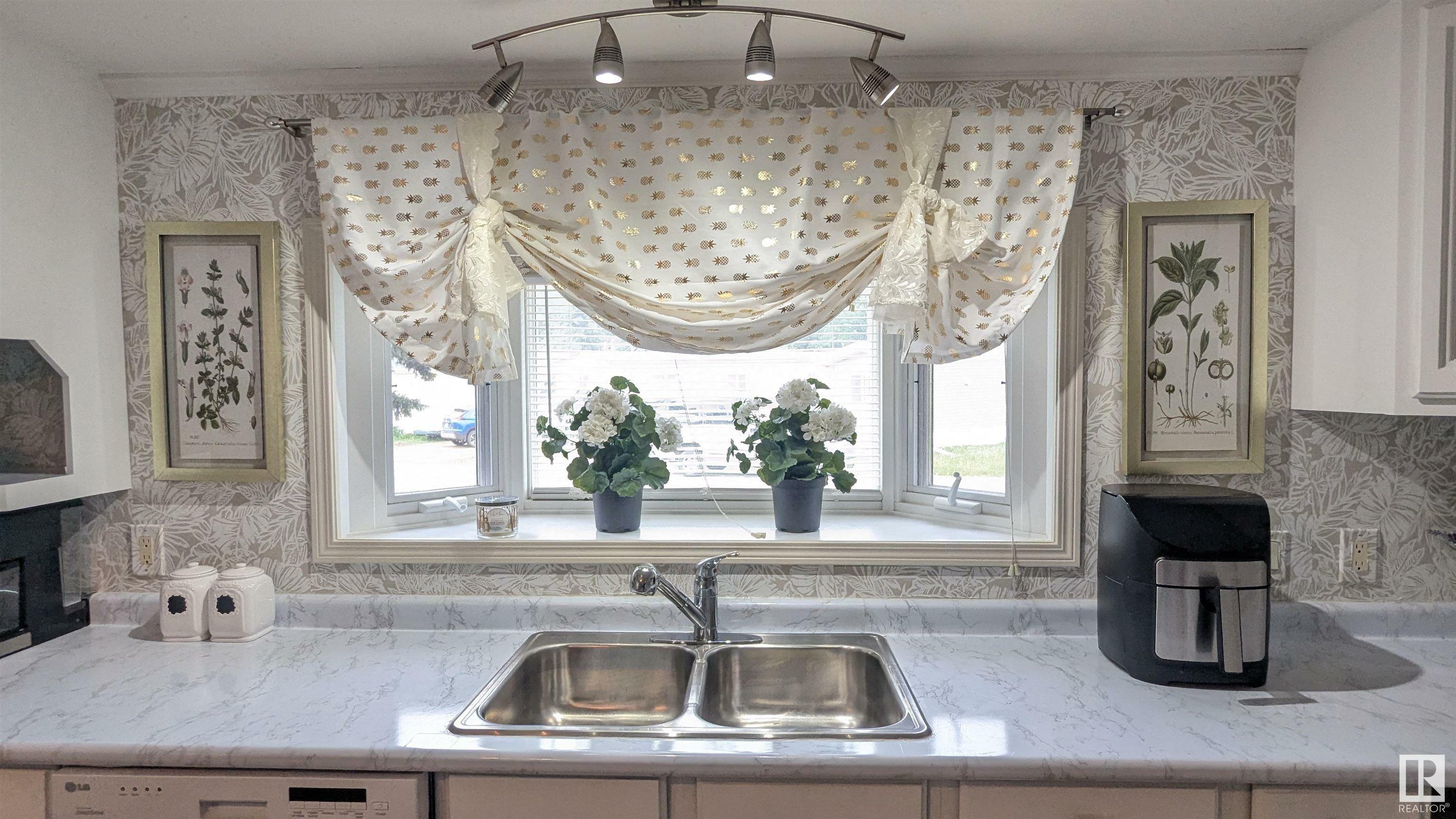 Property Photo: 26 Wood & Garden Estates AB T9C 1E9
