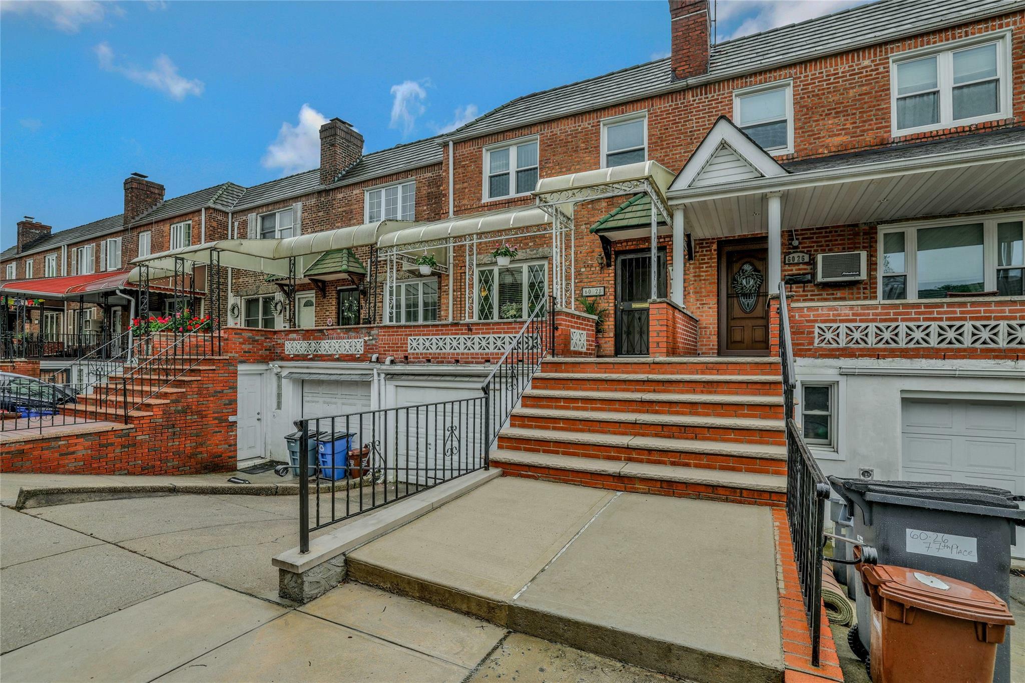 Property Photo: 60-28 77 Place NY 11379