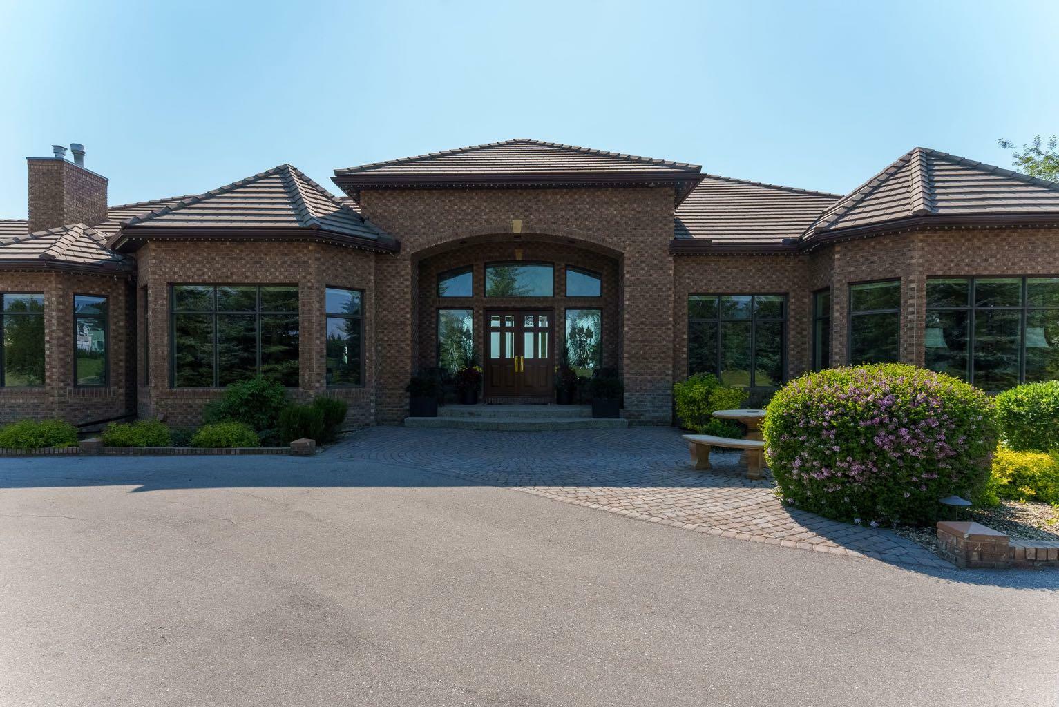 Property Photo: 31 Pinnacle Ridge Drive SW AB T3Z 3N7