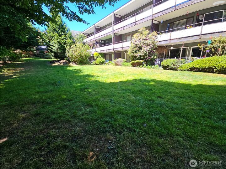 Property Photo: 7924 212th Street SW 104 WA 98026