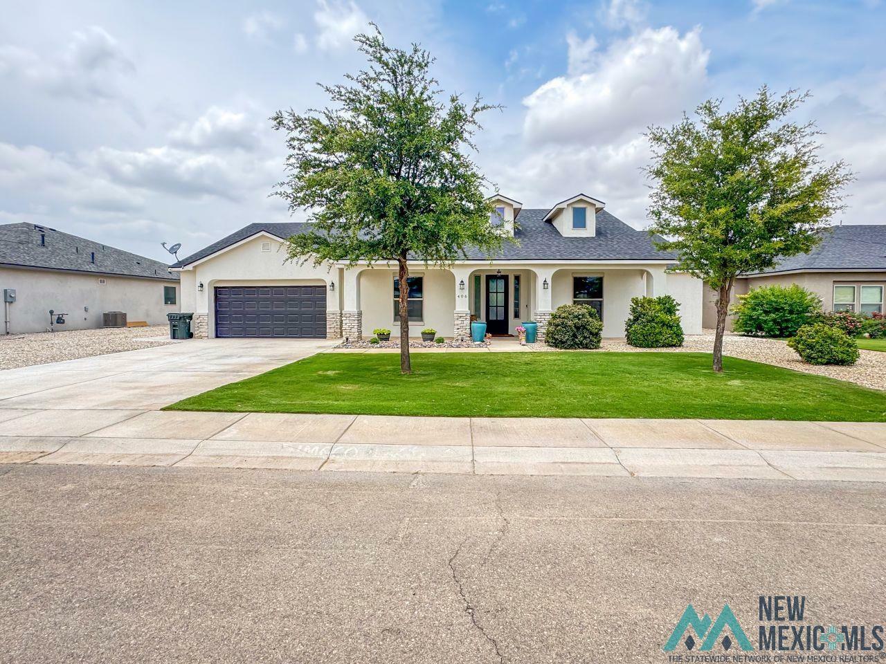 Property Photo: 406 Plantation Court NM 88220