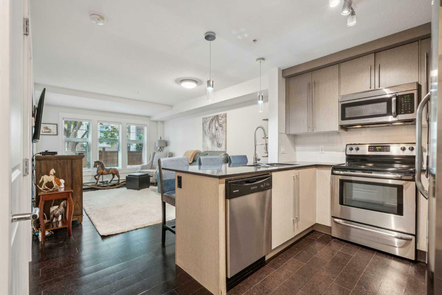 Property Photo: 11 Mahogany Row SE 2109 AB T3M 2L6