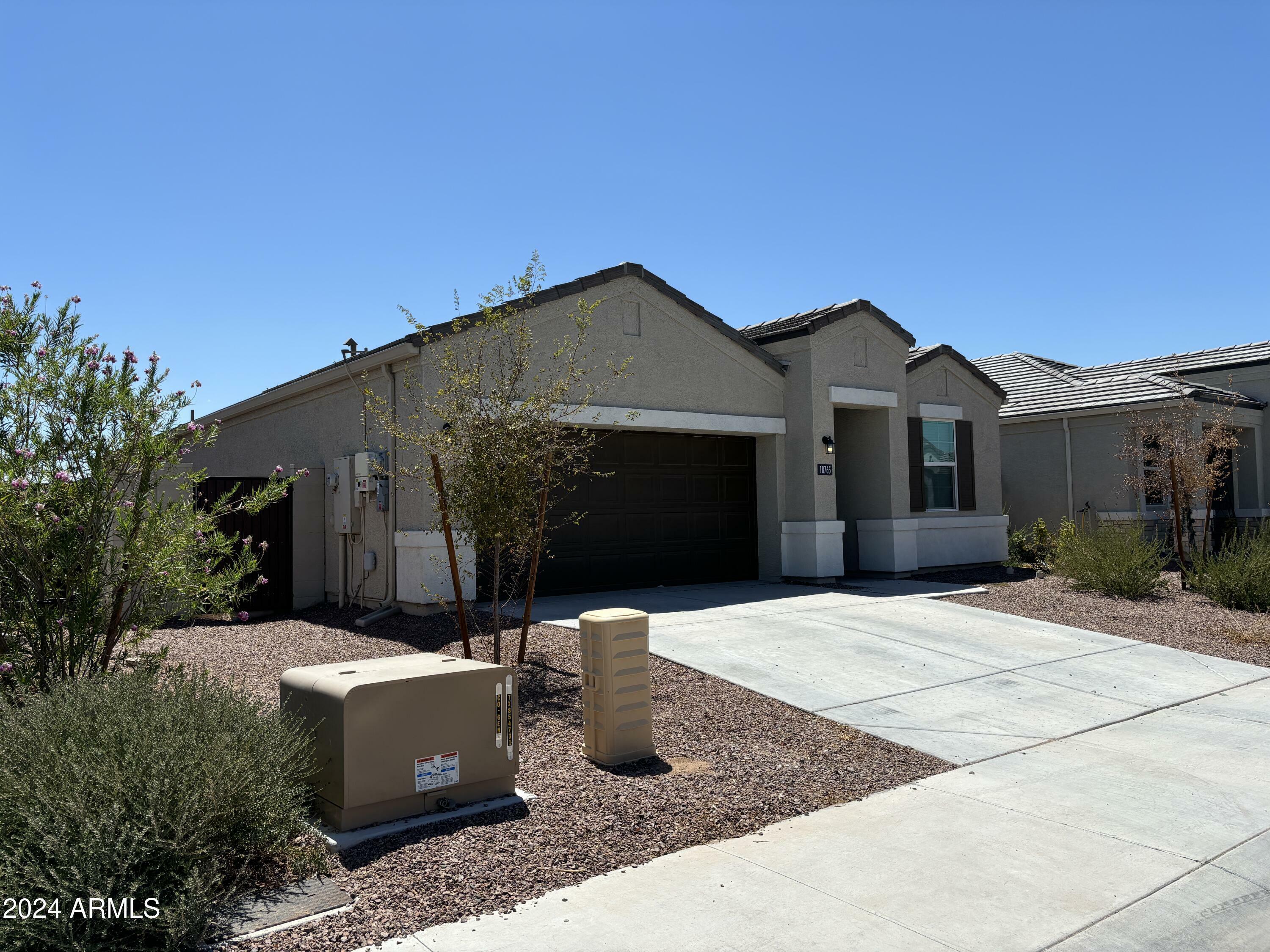 Property Photo: 18765 W Adams Street AZ 85326