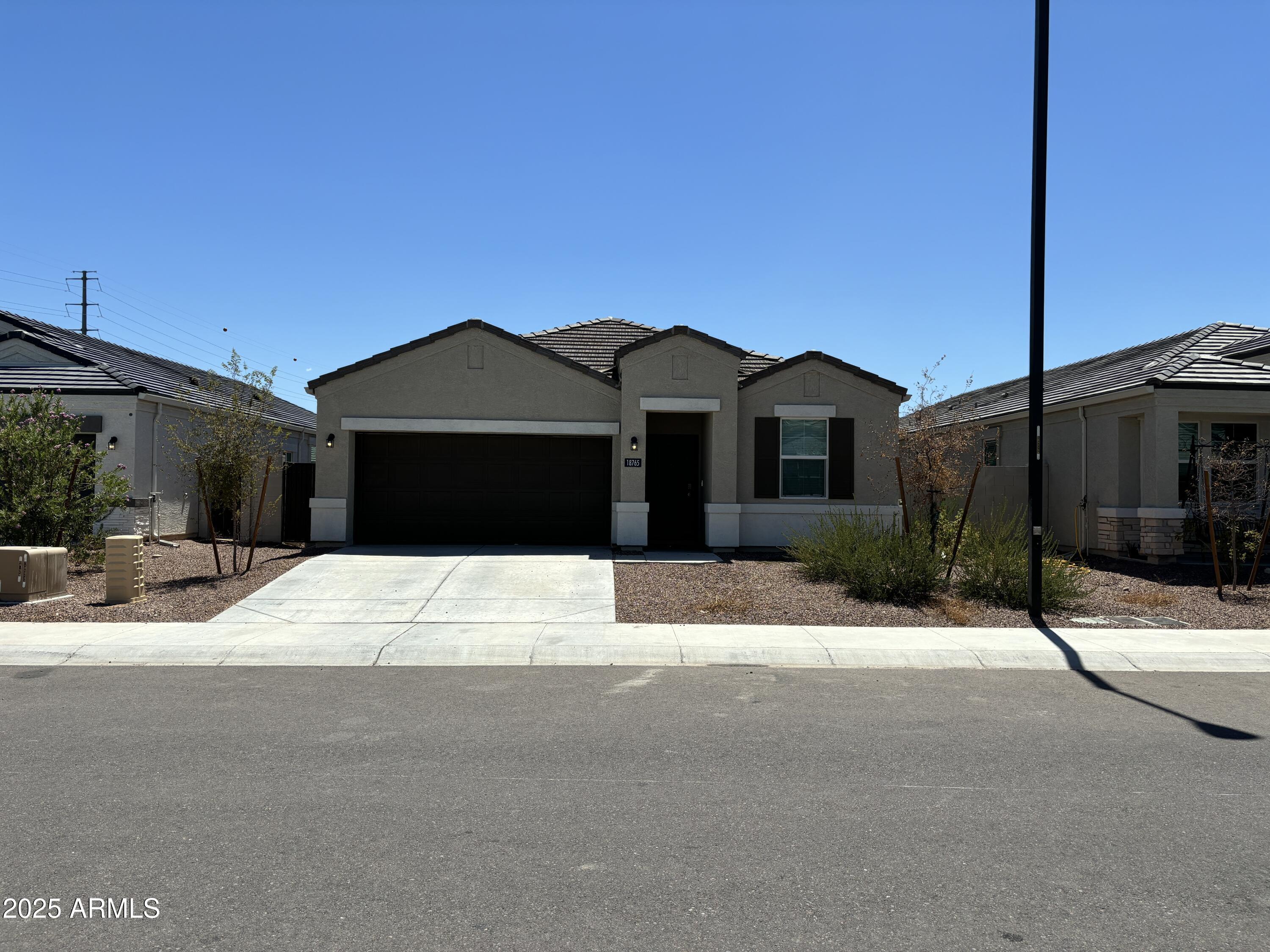 Property Photo: 18765 W Adams Street AZ 85326