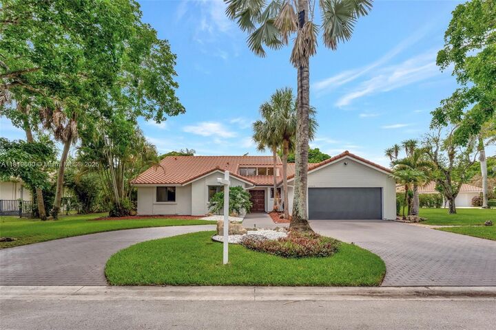 Property Photo: 8360 NW 51st Ct FL 33067