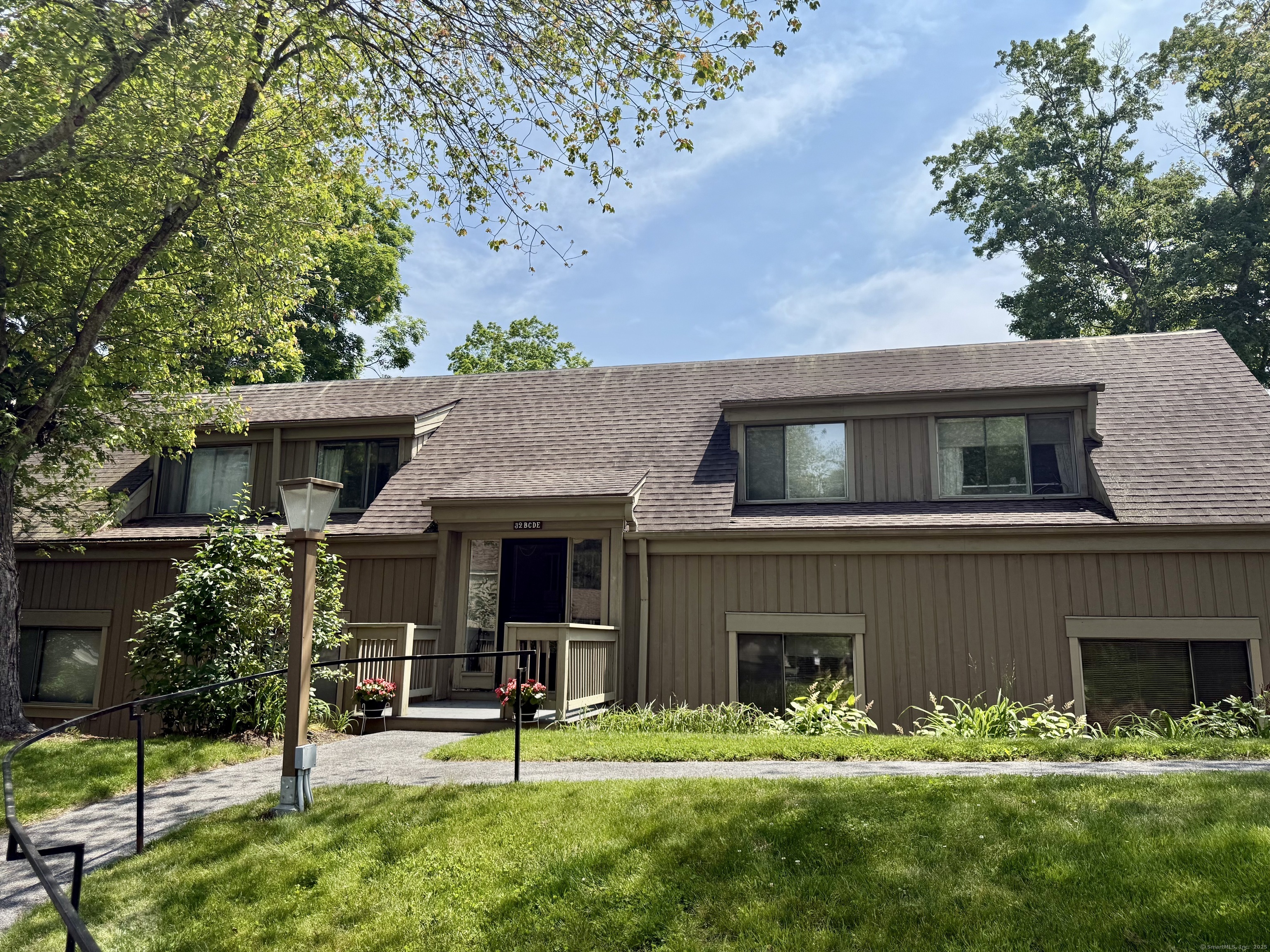 Property Photo: 32 Heritage Village C CT 06488