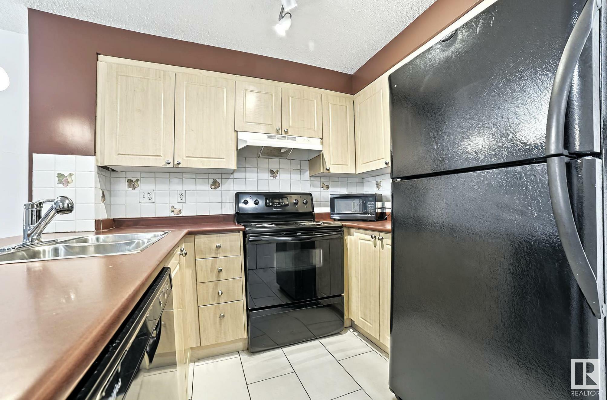 Property Photo: 622 McAllister Loop SW 111 AB T6W 1N1
