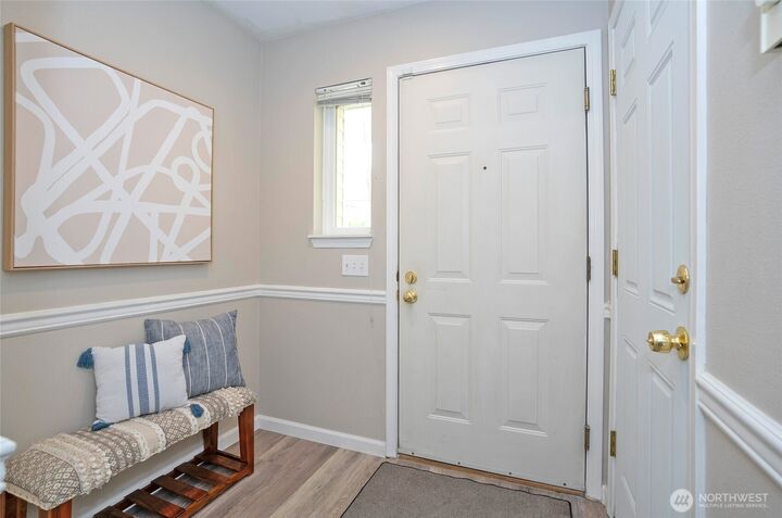 Property Photo:  6711 S 239th Place A103  WA 98032 