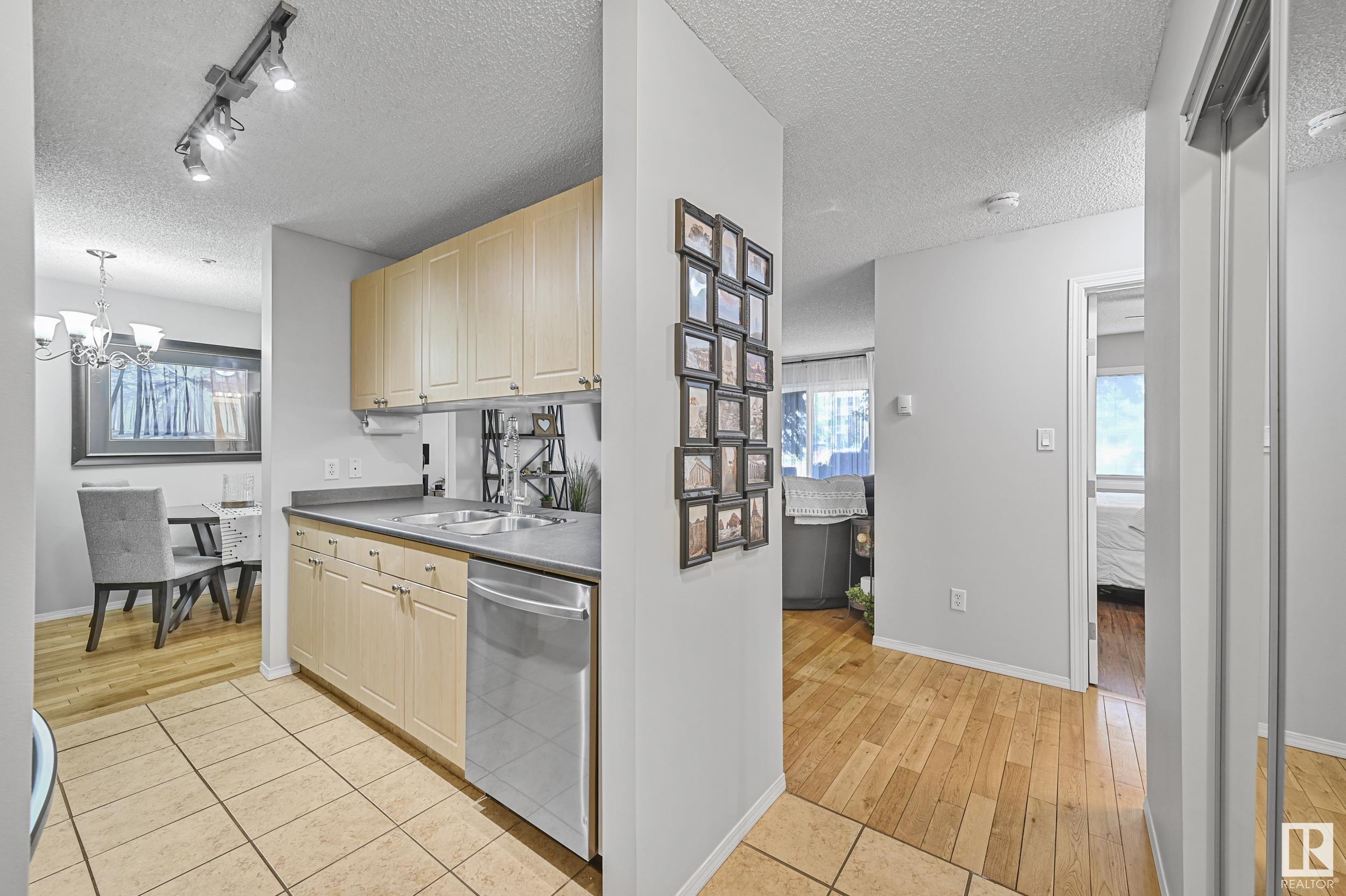 Property Photo:  70 Woodsmere Close 117  AB T8L 4R8 