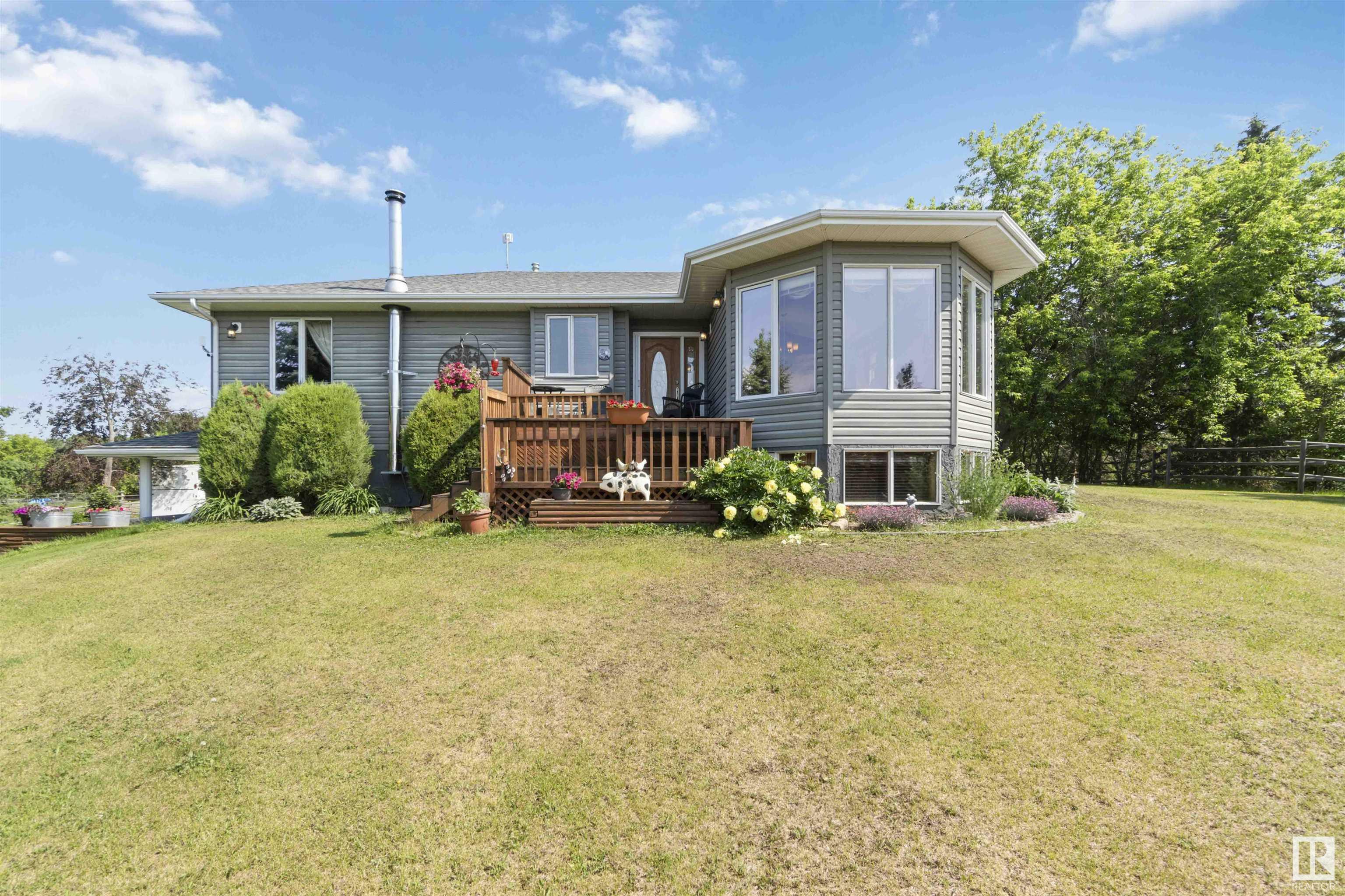 Property Photo: 1103 Twp Road 540 128 AB T7Z 1X3