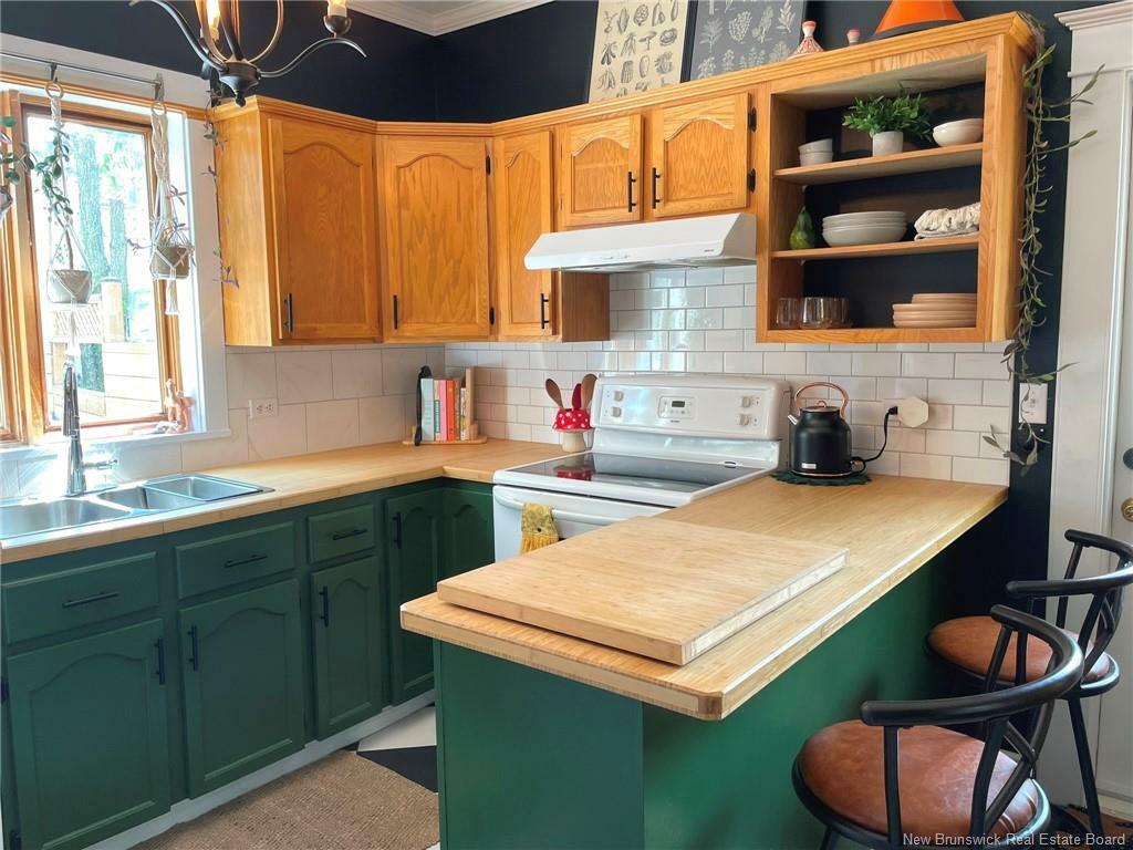 Property Photo:  32-34 Bernier  NB E3V 1Y5 