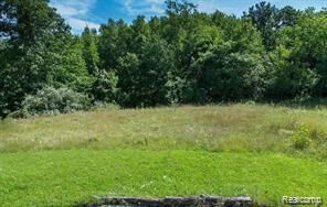 Property Photo:  9056 Deerwood Road  MI 48348 