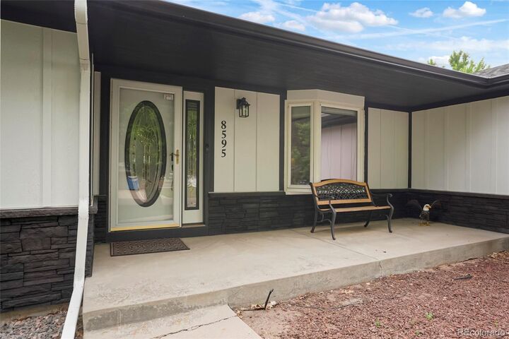 Property Photo: 8595 S Yarrow Street CO 80128