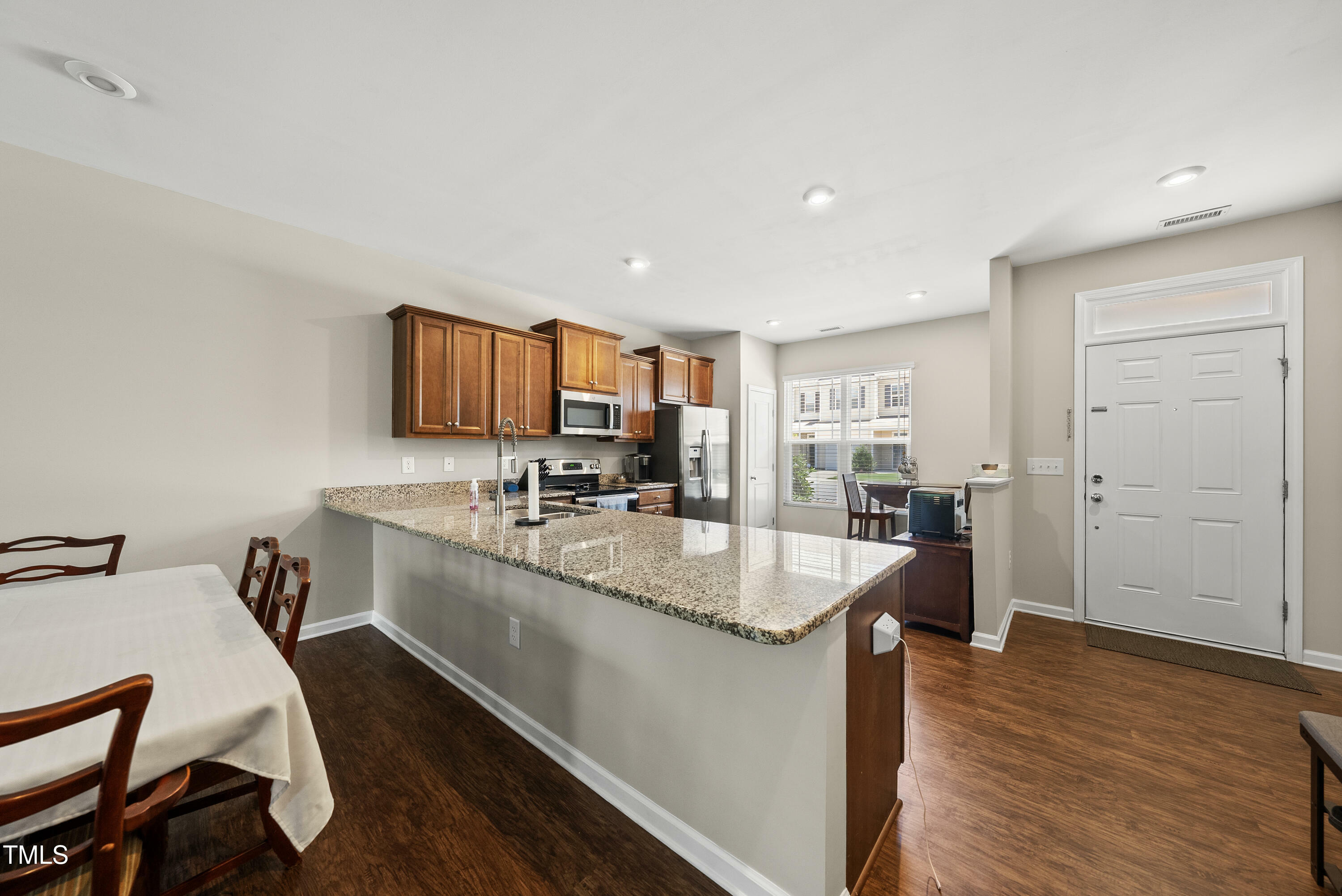 Property Photo:  8885 Commons Townes Drive  NC 27616 