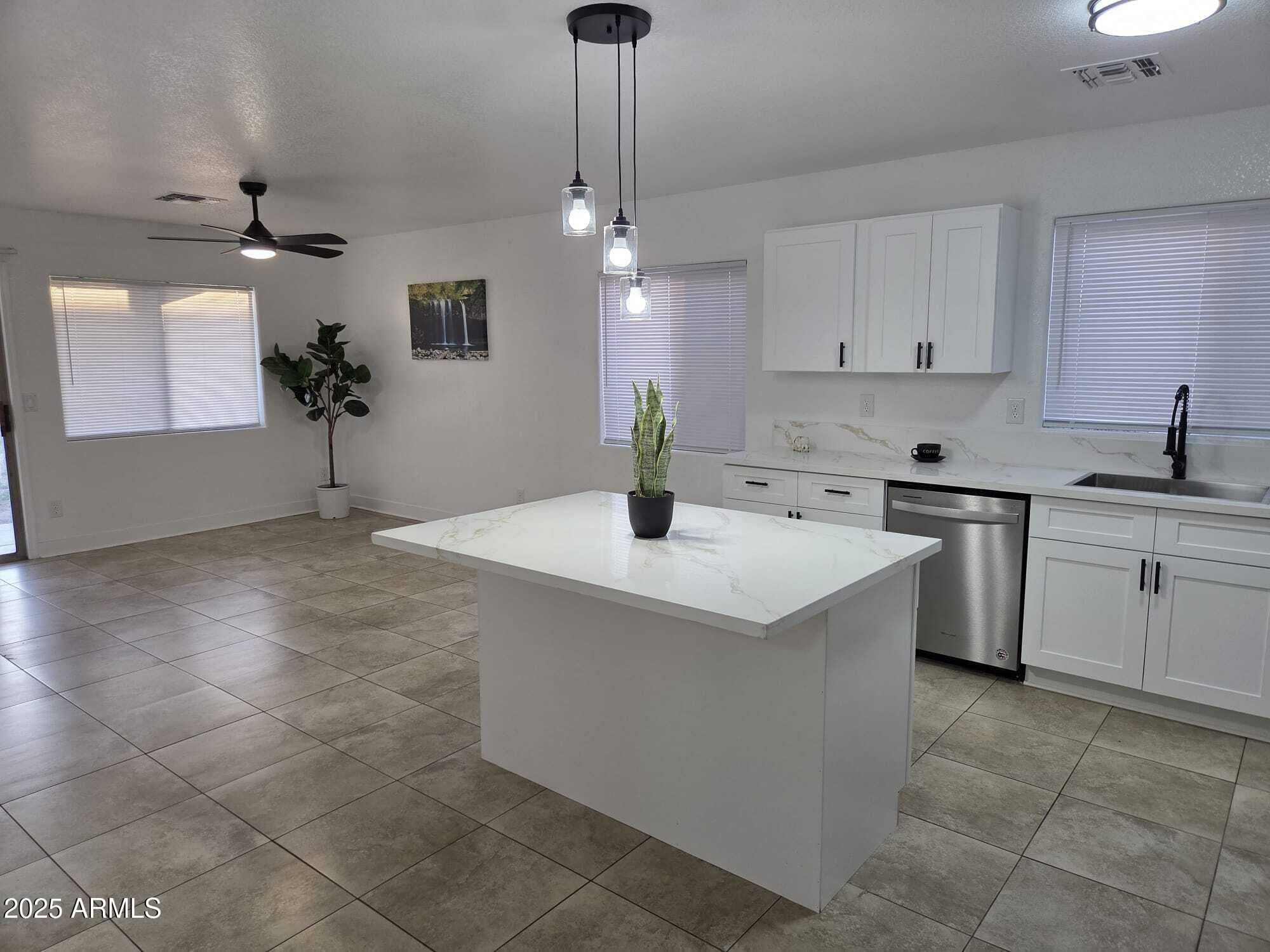 Property Photo: 13606 N 130th Avenue AZ 85335