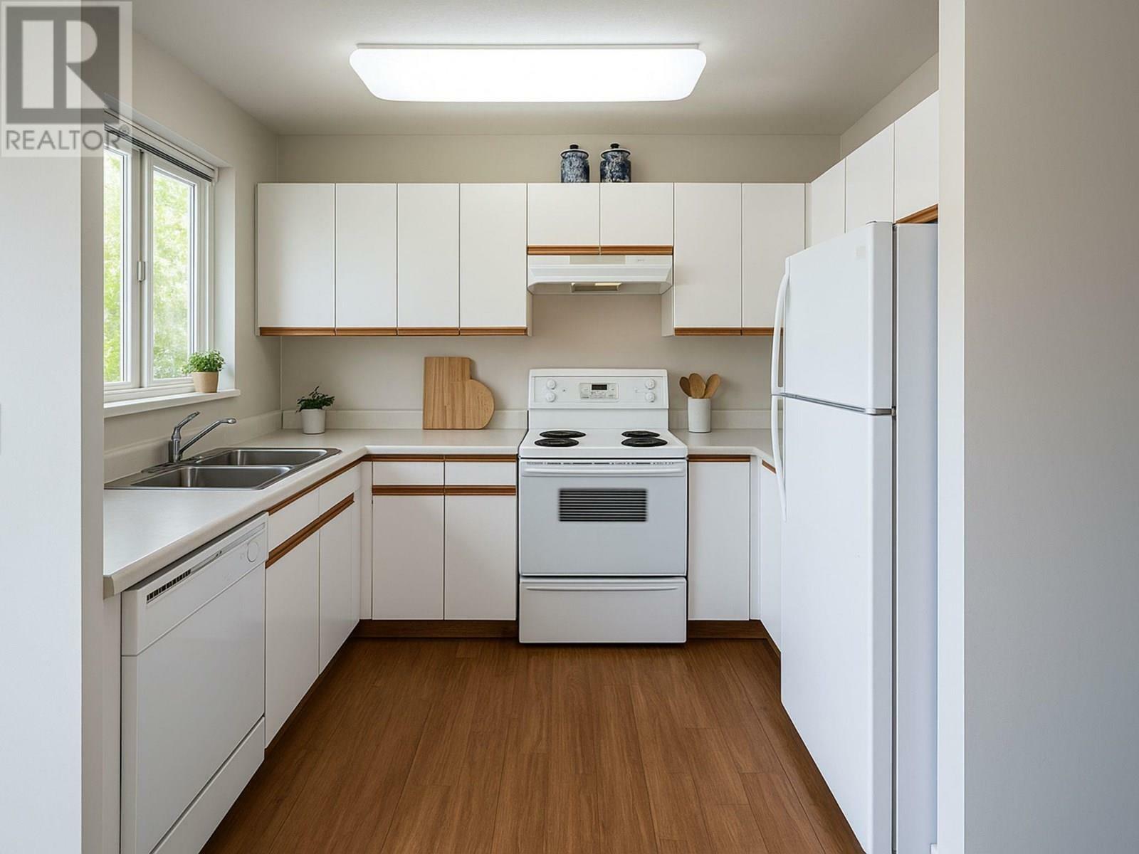 Property Photo: 831 2nd Street Southeast 103 BC V1E 1S6