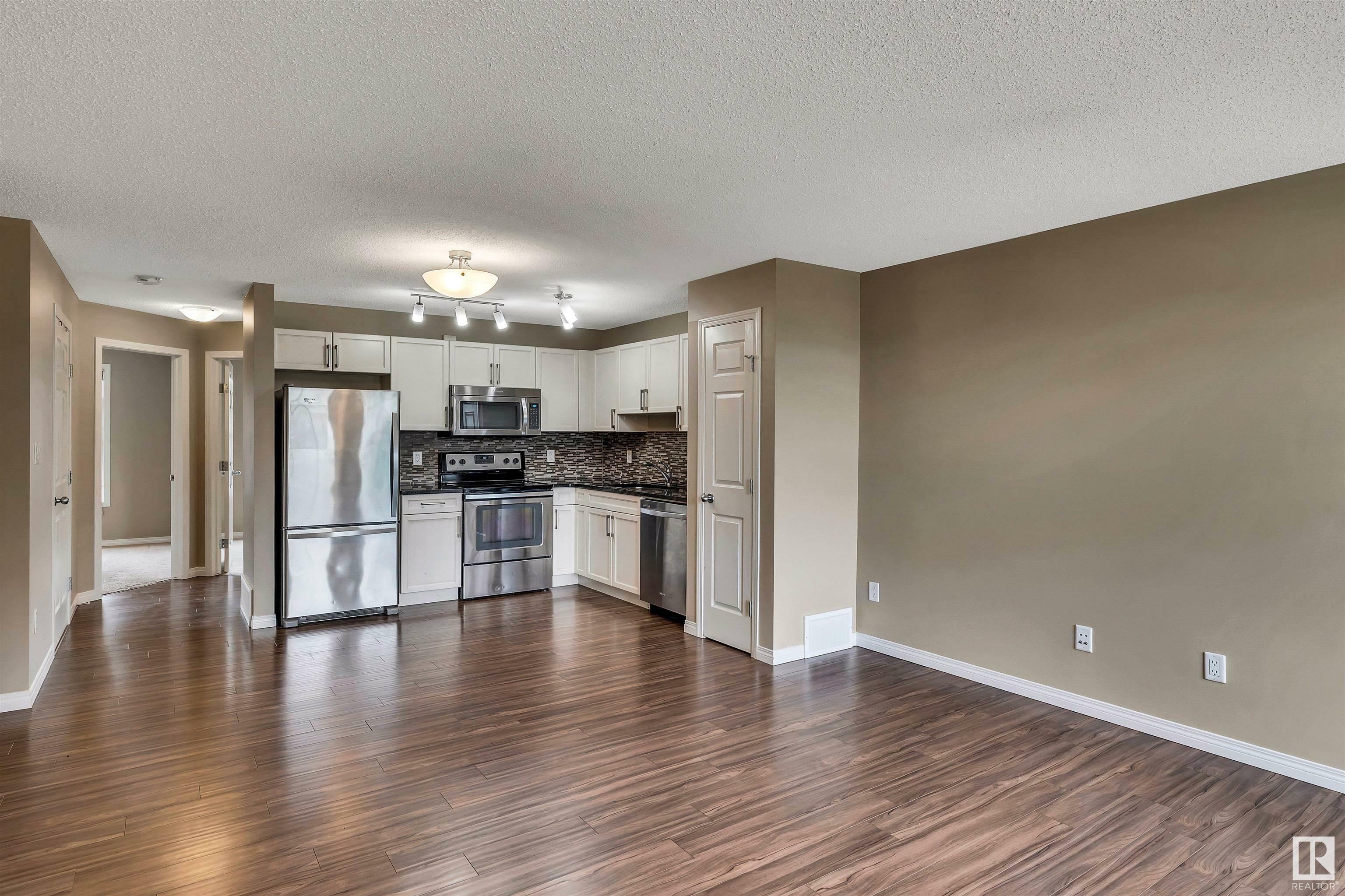 Property Photo: 4029 Orchards Drive SW 60 AB T6X 1V2