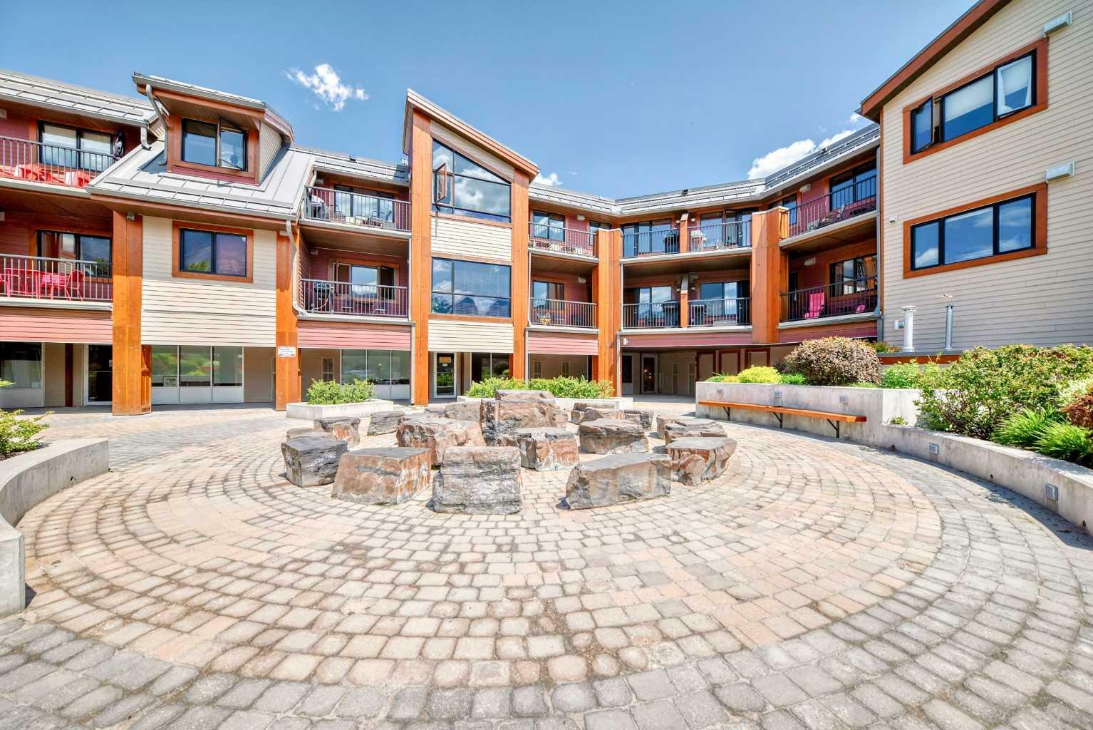 Property Photo:  1002 8 Avenue 311  AB T1W 0C4 