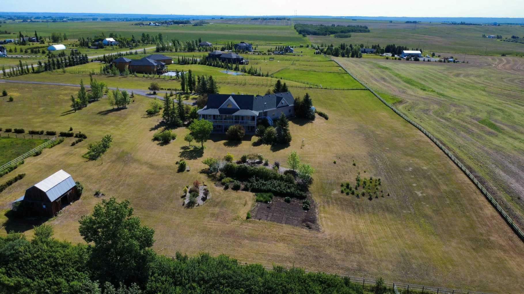 Property Photo: 56065 Ridgeview Drive E AB T1S 5A9