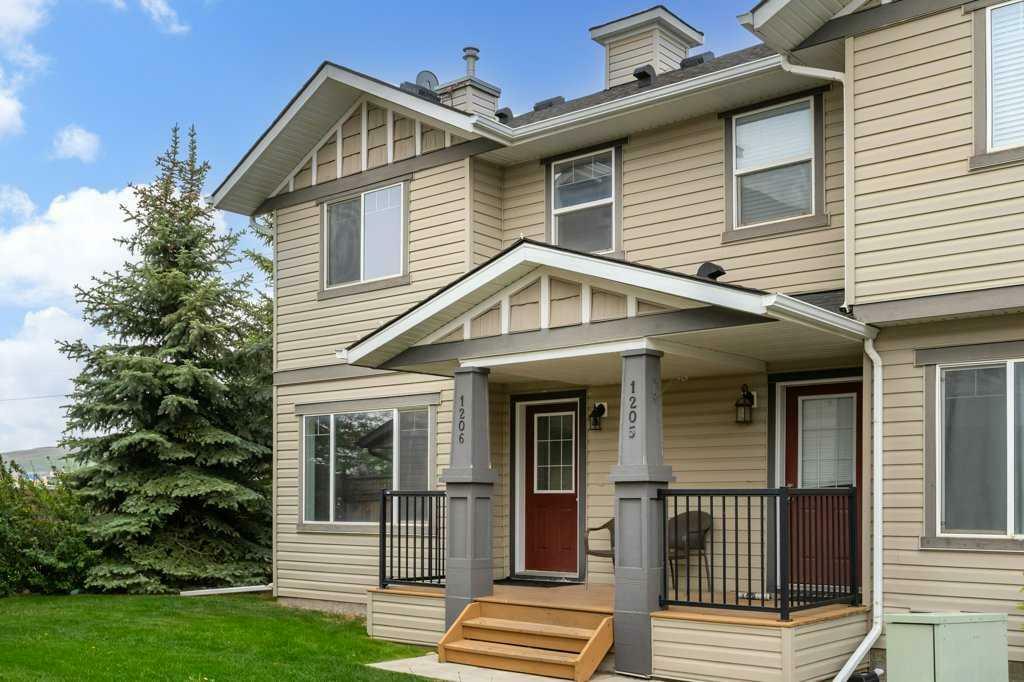 Property Photo: 2384 Sagewood Gate SW 1206 AB T4B 0K7