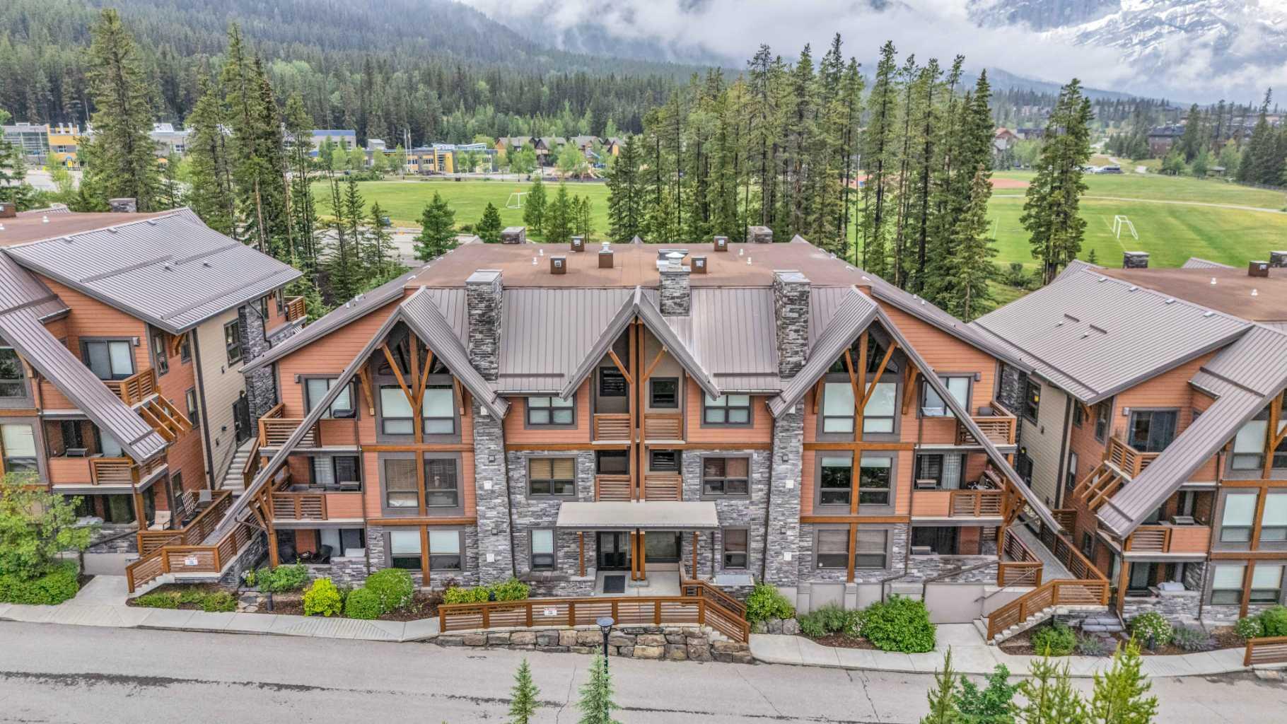 Property Photo:  2100B Stewart Creek Drive 201  AB T1W 0G3 