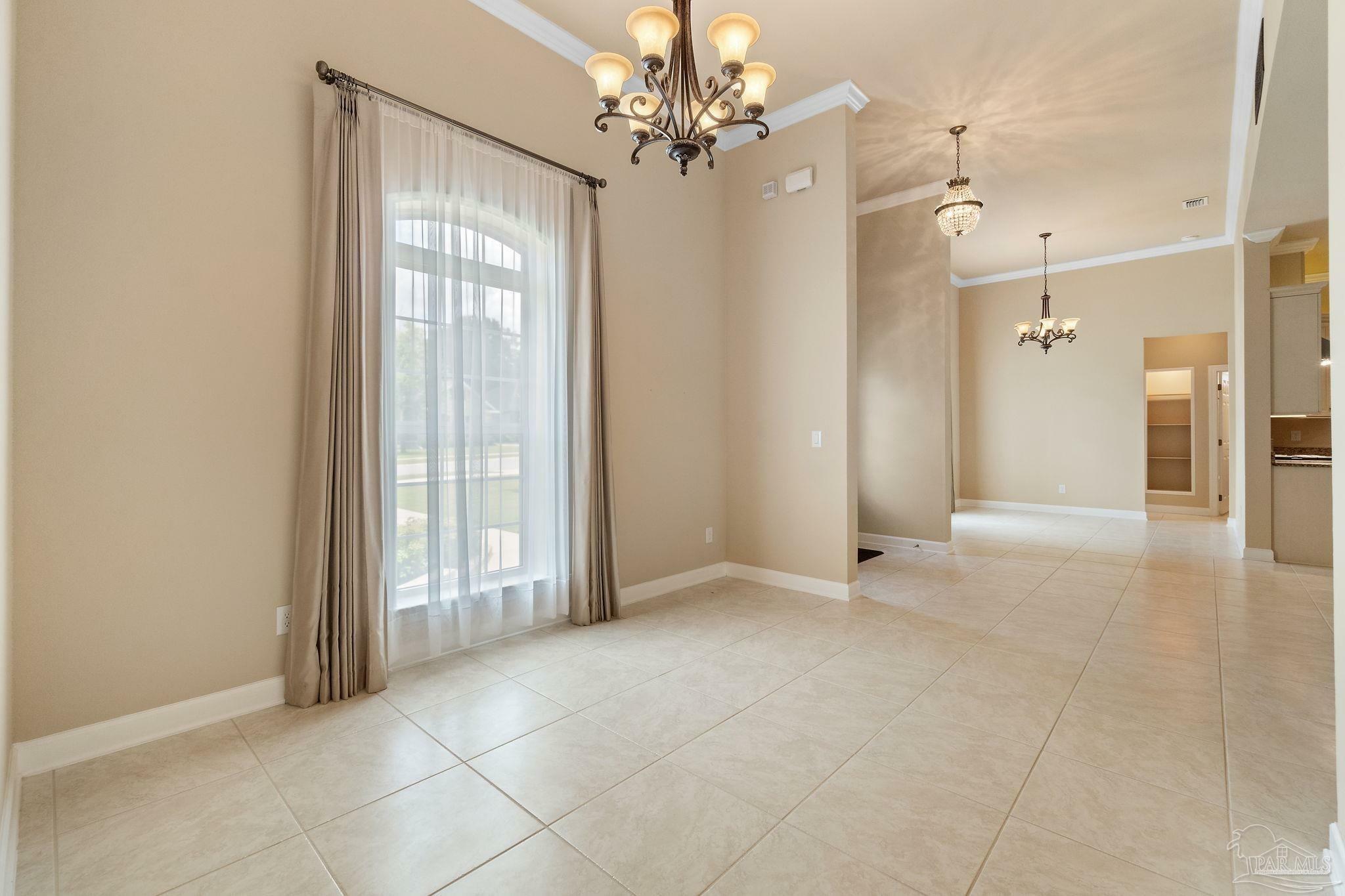 Property Photo: 8821 Marsh Elder Dr FL 32526