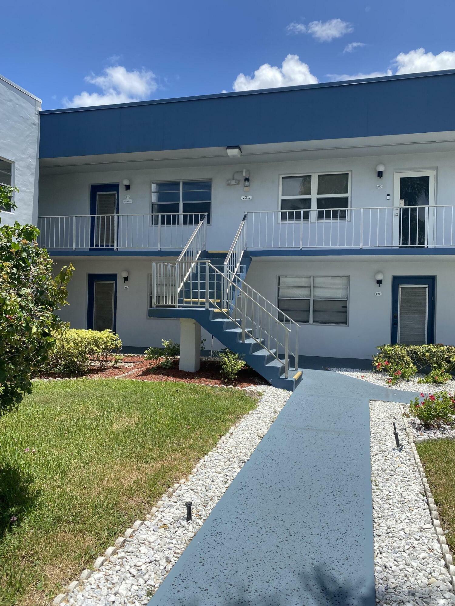 Property Photo:  74 Normandy B  FL 33484 
