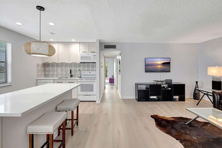 Property Photo:  74 Normandy B  FL 33484 