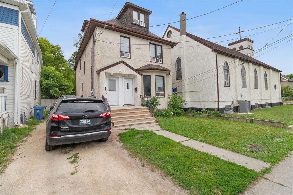 Property Photo: 383 Aikins Street MB R2W 4H2