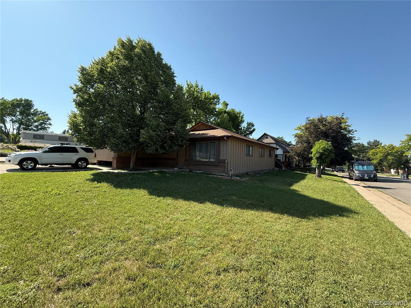 Property Photo: 8995 E Cornell Avenue CO 80231