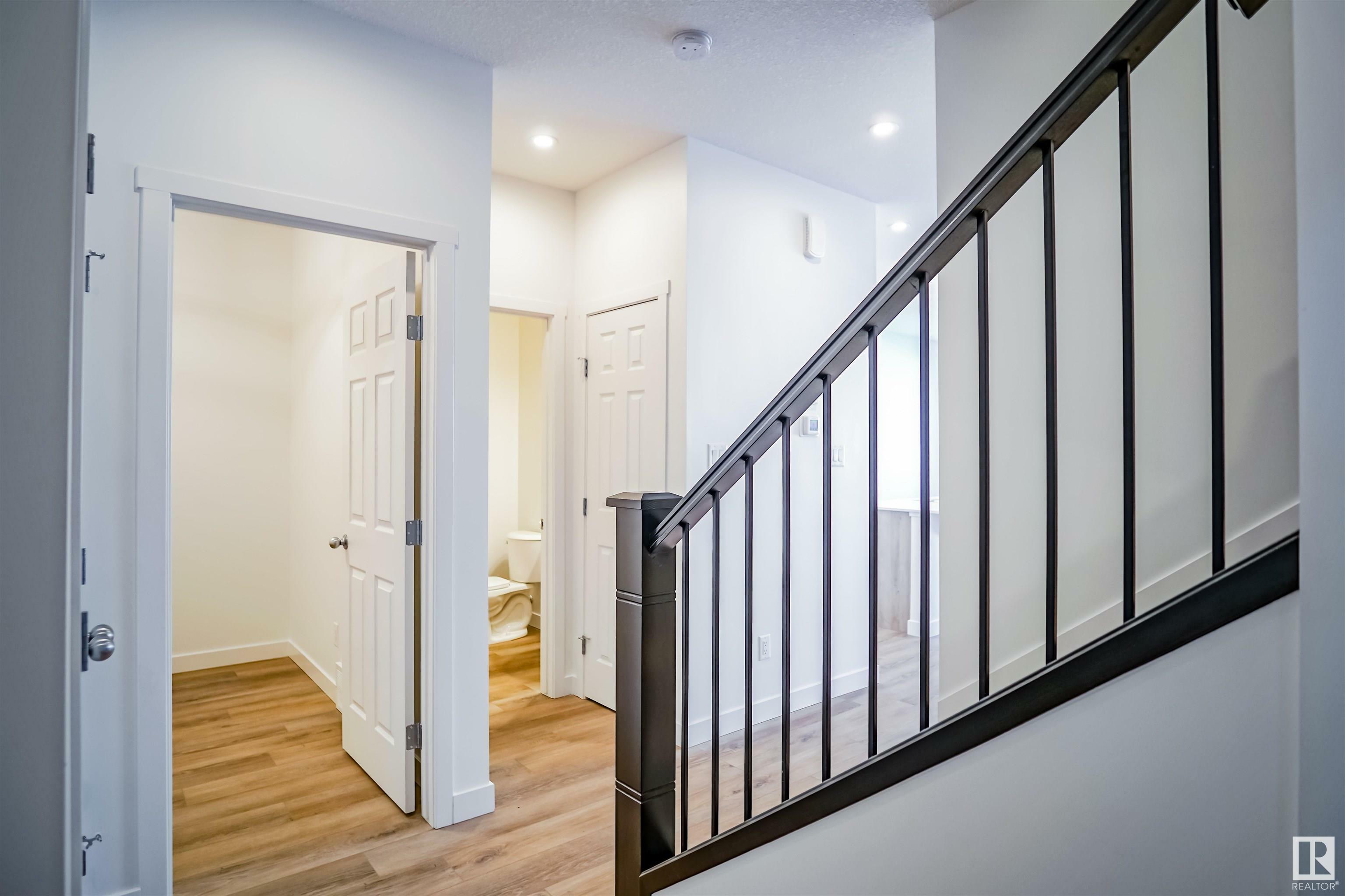Property Photo: 20936 16 Avenue NW AB T6W 5G7
