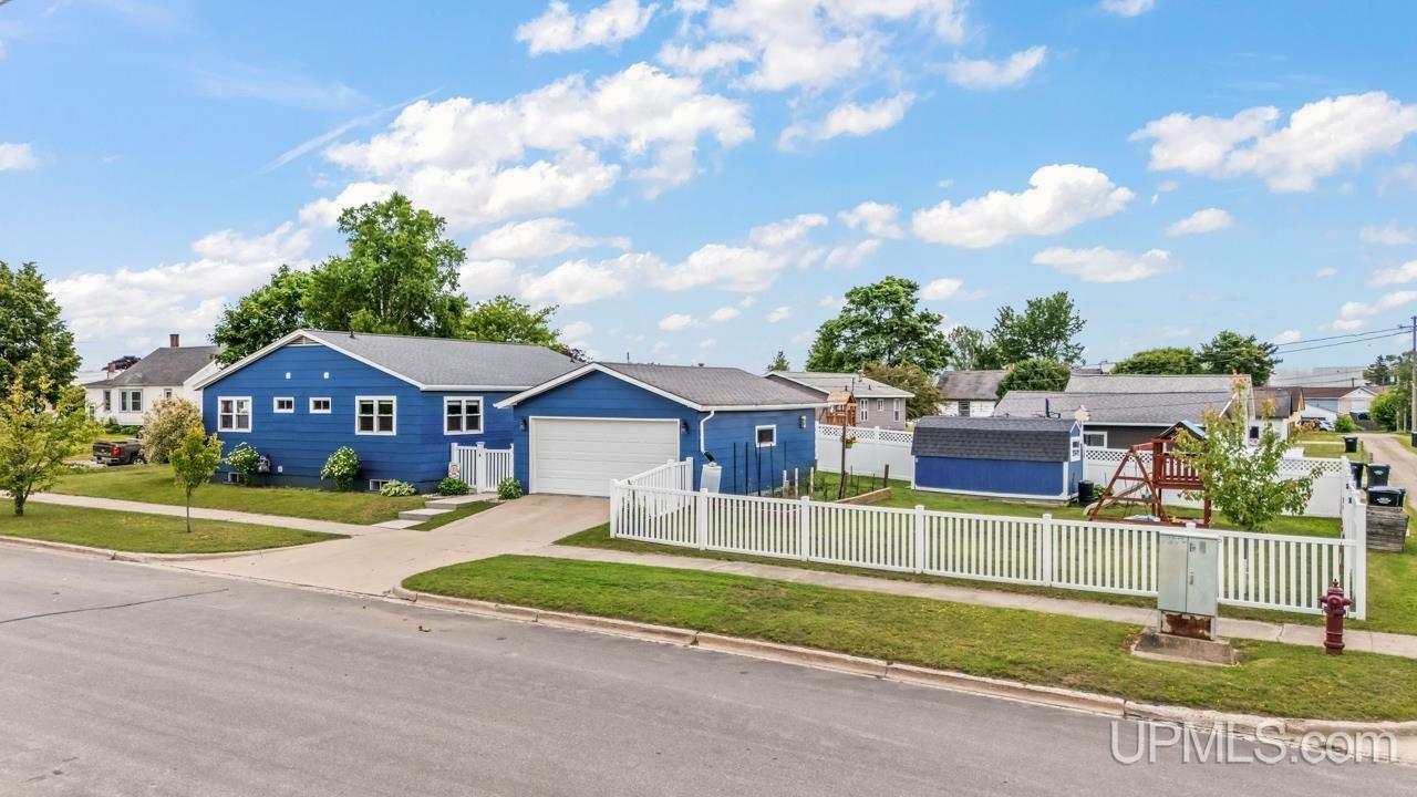 Property Photo:  319 Minnesota Avenue  MI 49837 