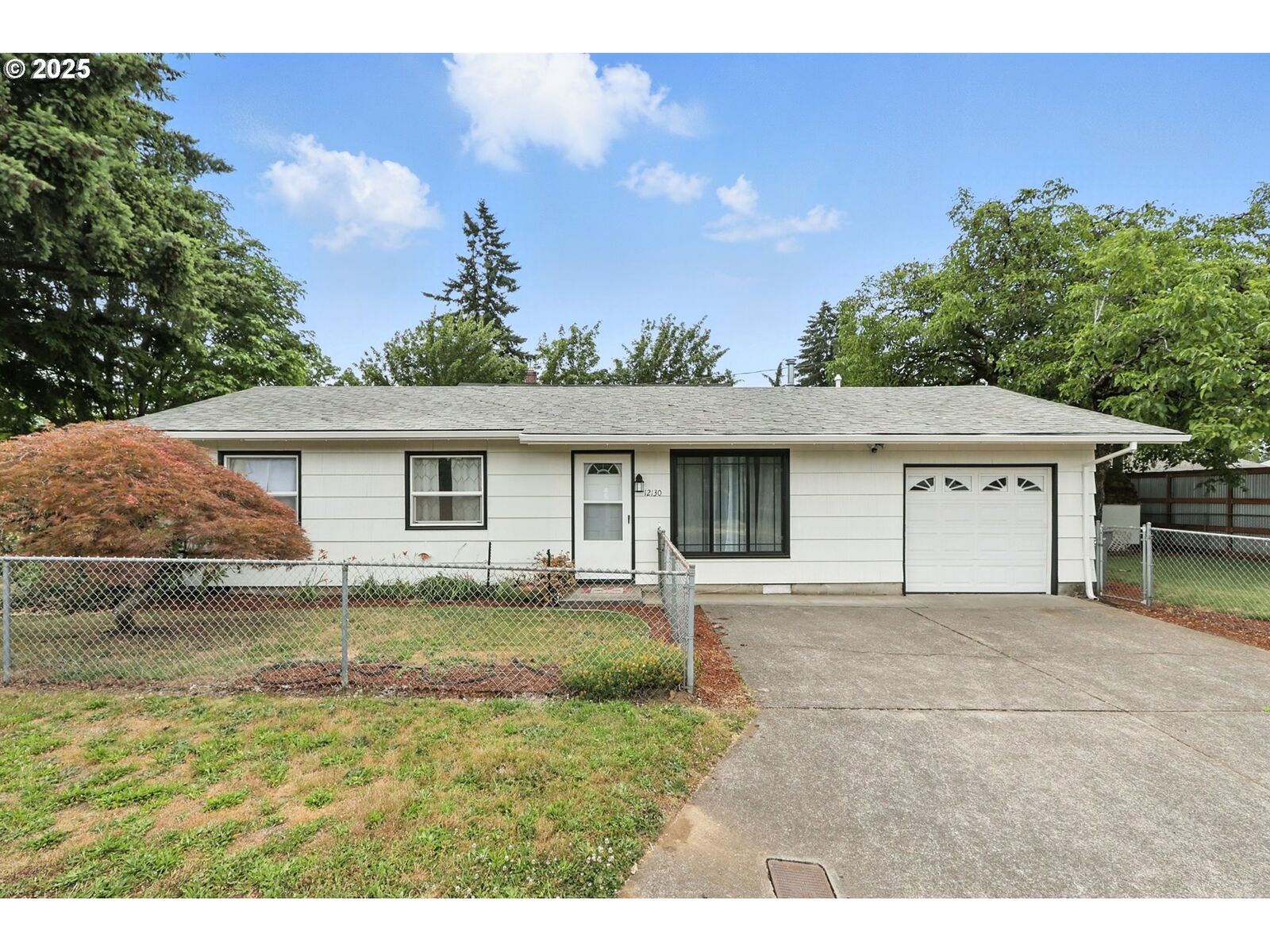 Property Photo:  12130 SE Reedway St  OR 97266 
