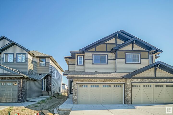 Property Photo: 111 Ficus Way AB T8L 0Z6