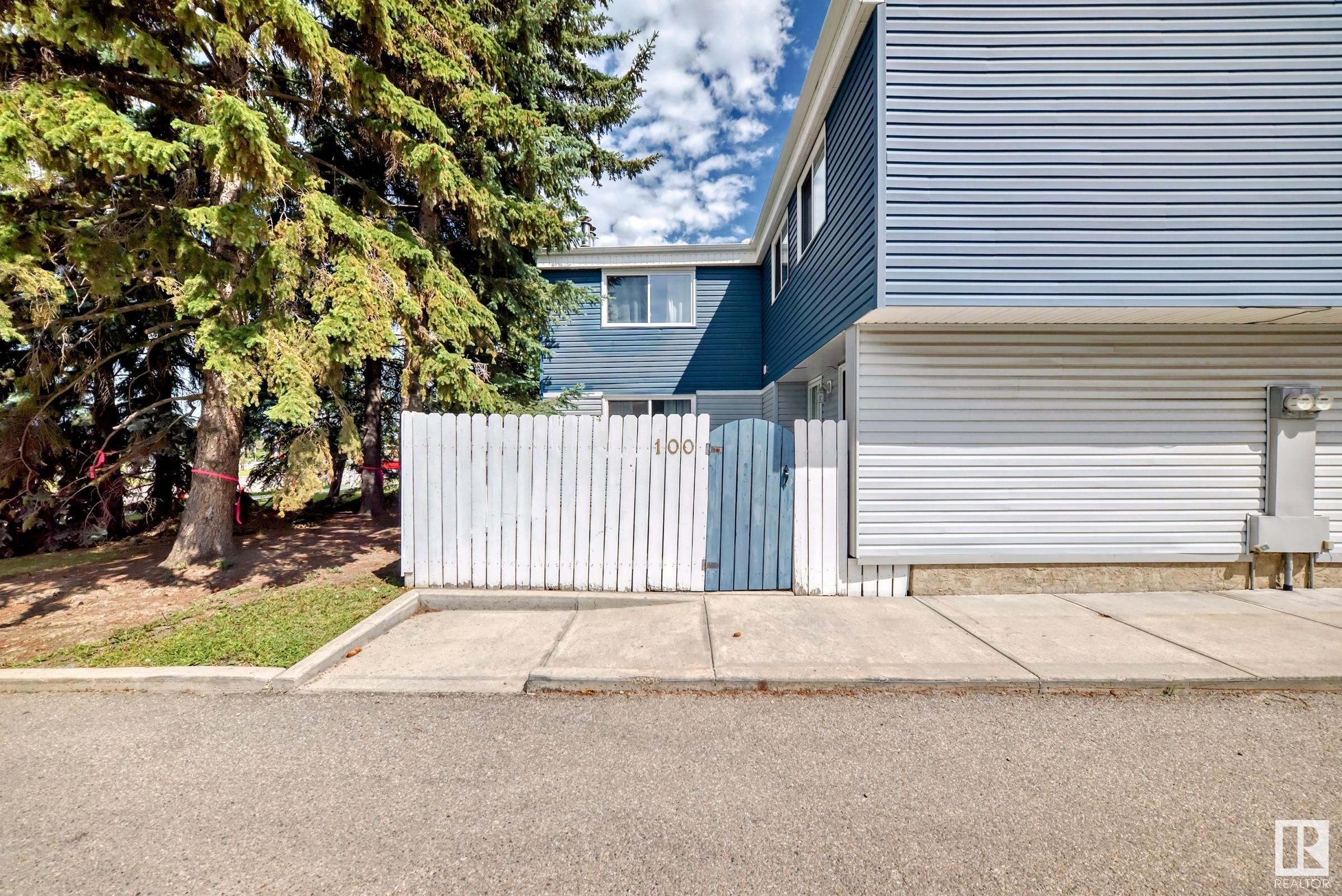 Property Photo: 14707 53 Avenue NW 100 AB T6H 5C9