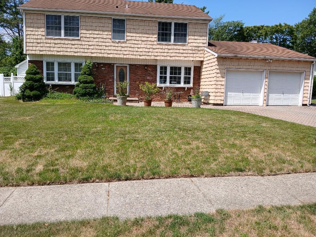Property Photo: 38 Tulip Grove Drive NY 11755