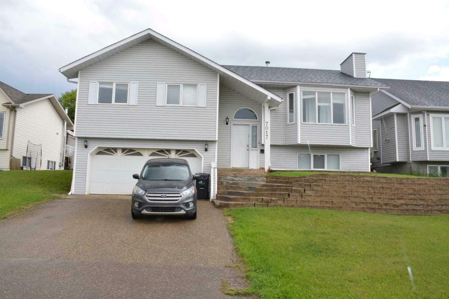 Property Photo: 7017 99 Street AB T8S 1B4