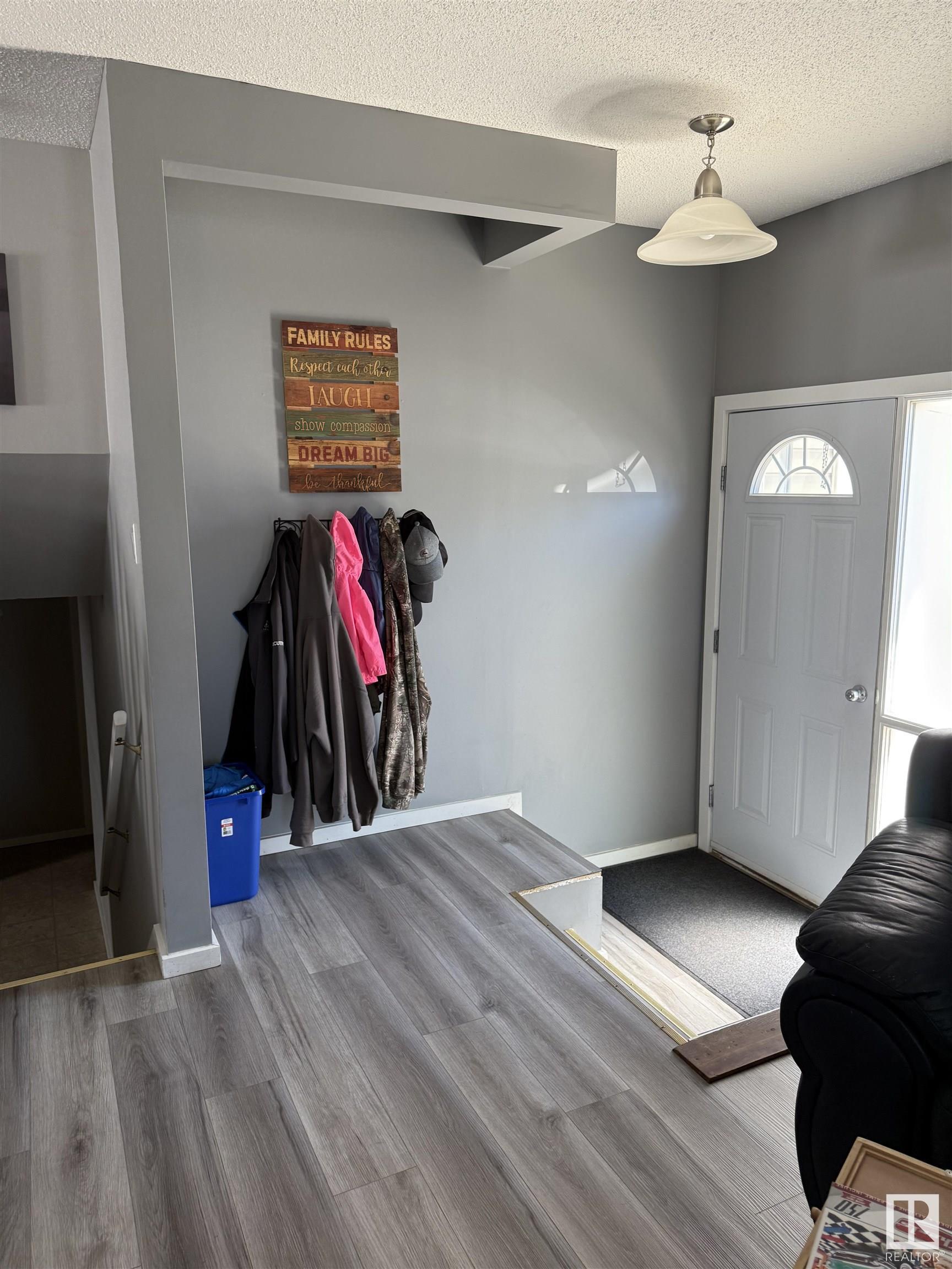 Property Photo: 5813 49 Street AB T9C 1H1