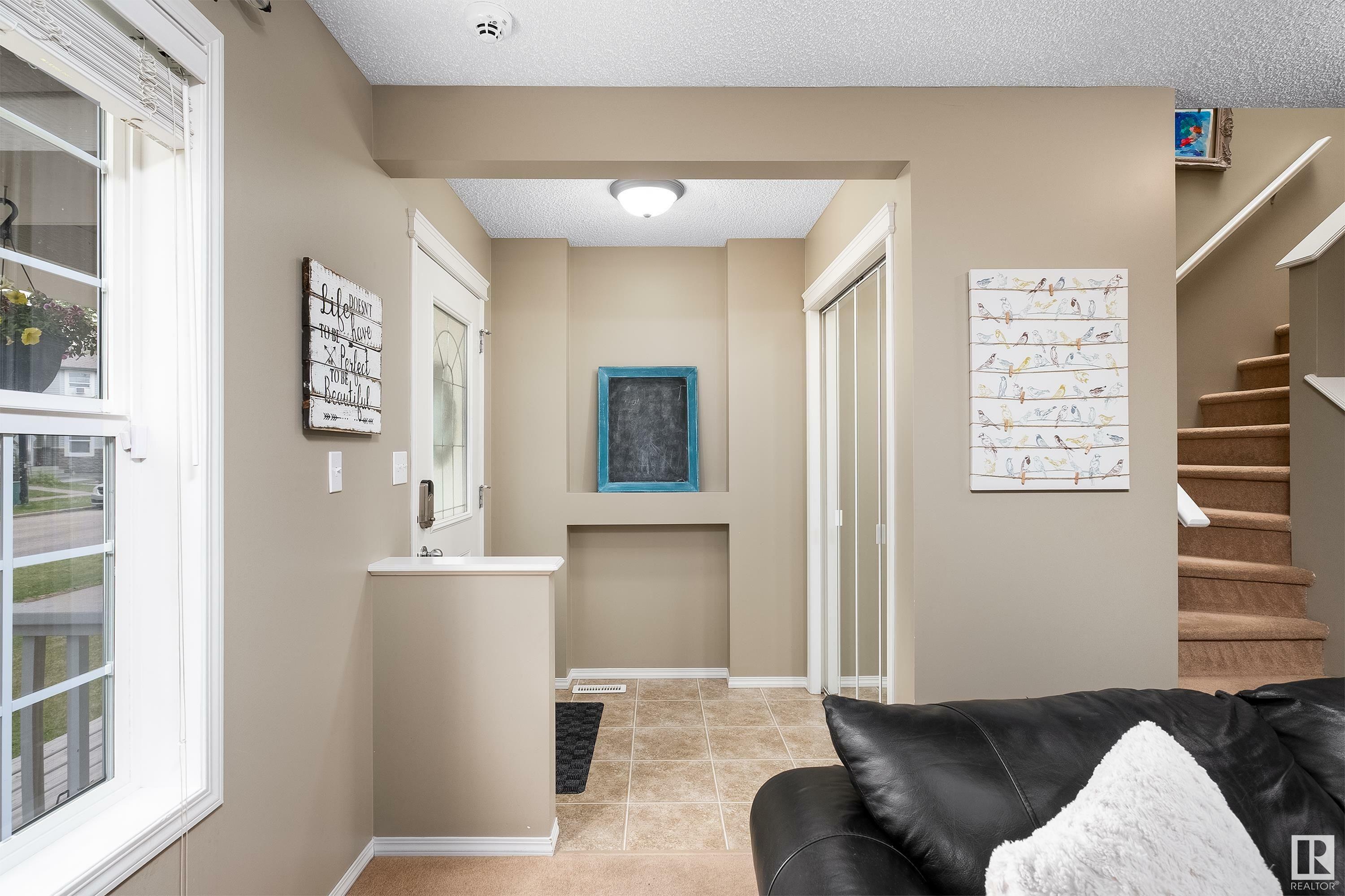 Property Photo: 4 Summerland Way AB T8H 2P2