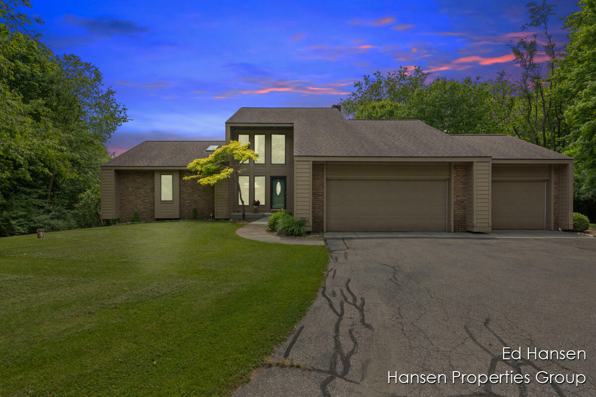 Property Photo:  7450 Roguewood Drive NE  MI 49306 