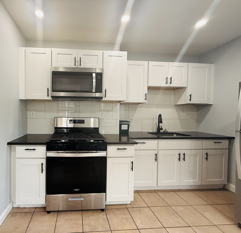 Property Photo: 183 Windsor St 1 MA 02139