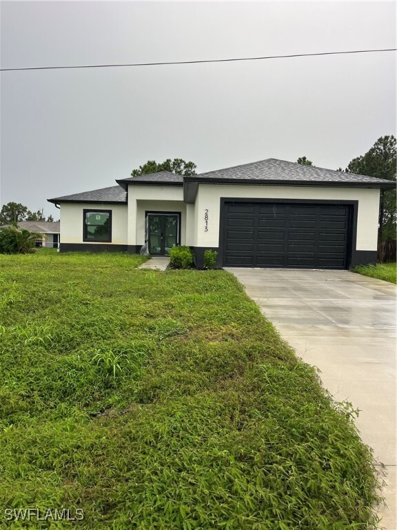 Property Photo: 2813 27th Street SW FL 33976